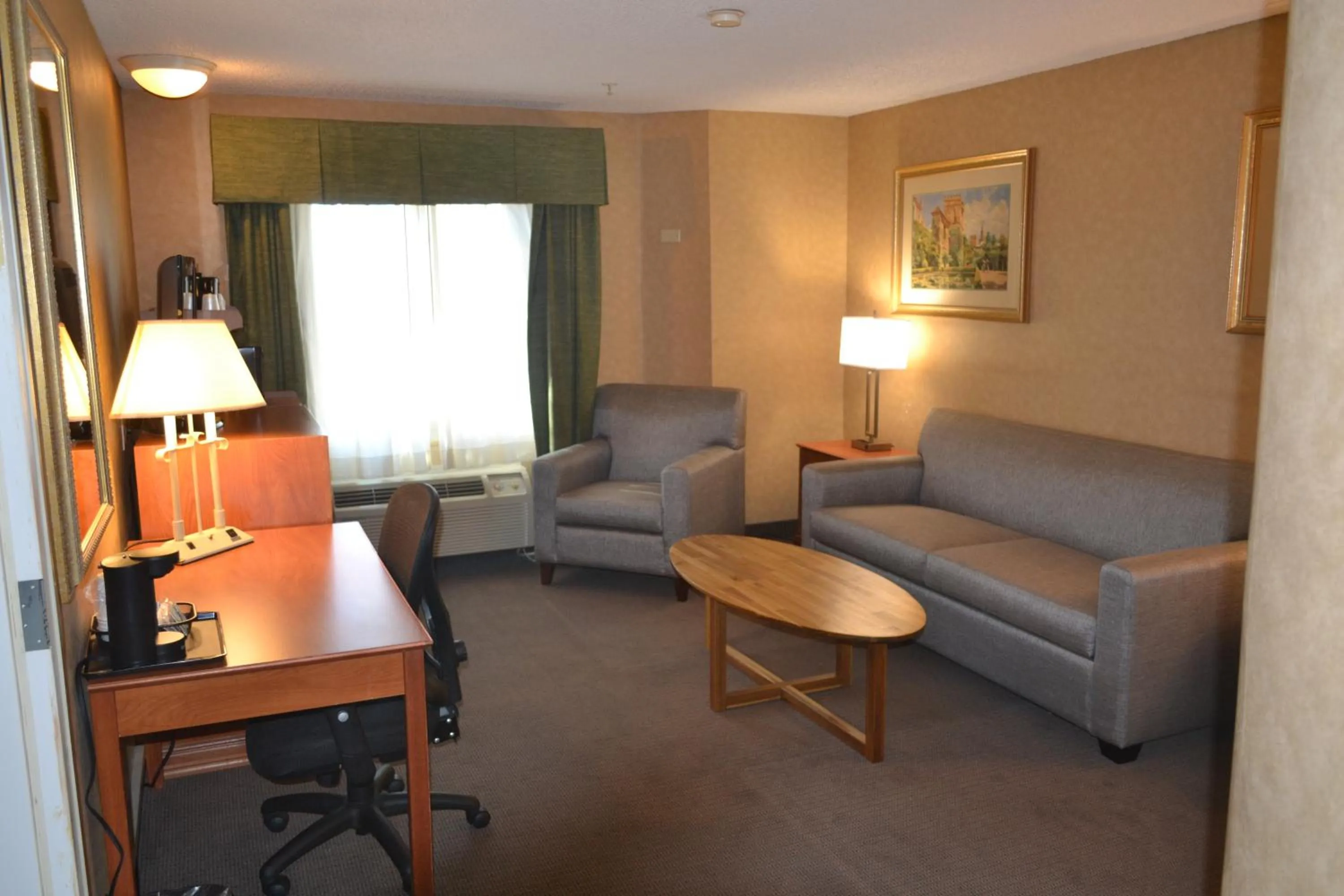 Living room in Baymont by Wyndham Barstow Historic Route 66
