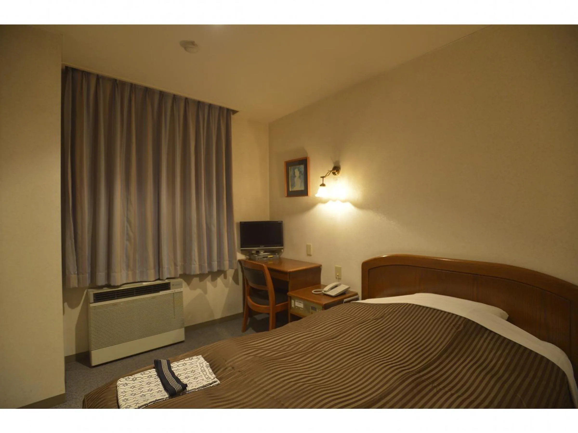 Photo of the whole room, Bed in Famy Inn Makuhari