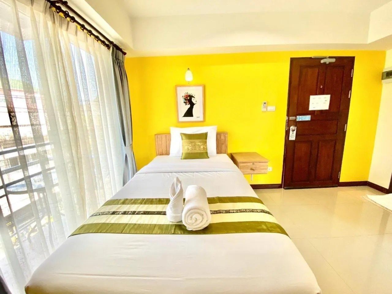 Bed in Chinda Boutique Hotel