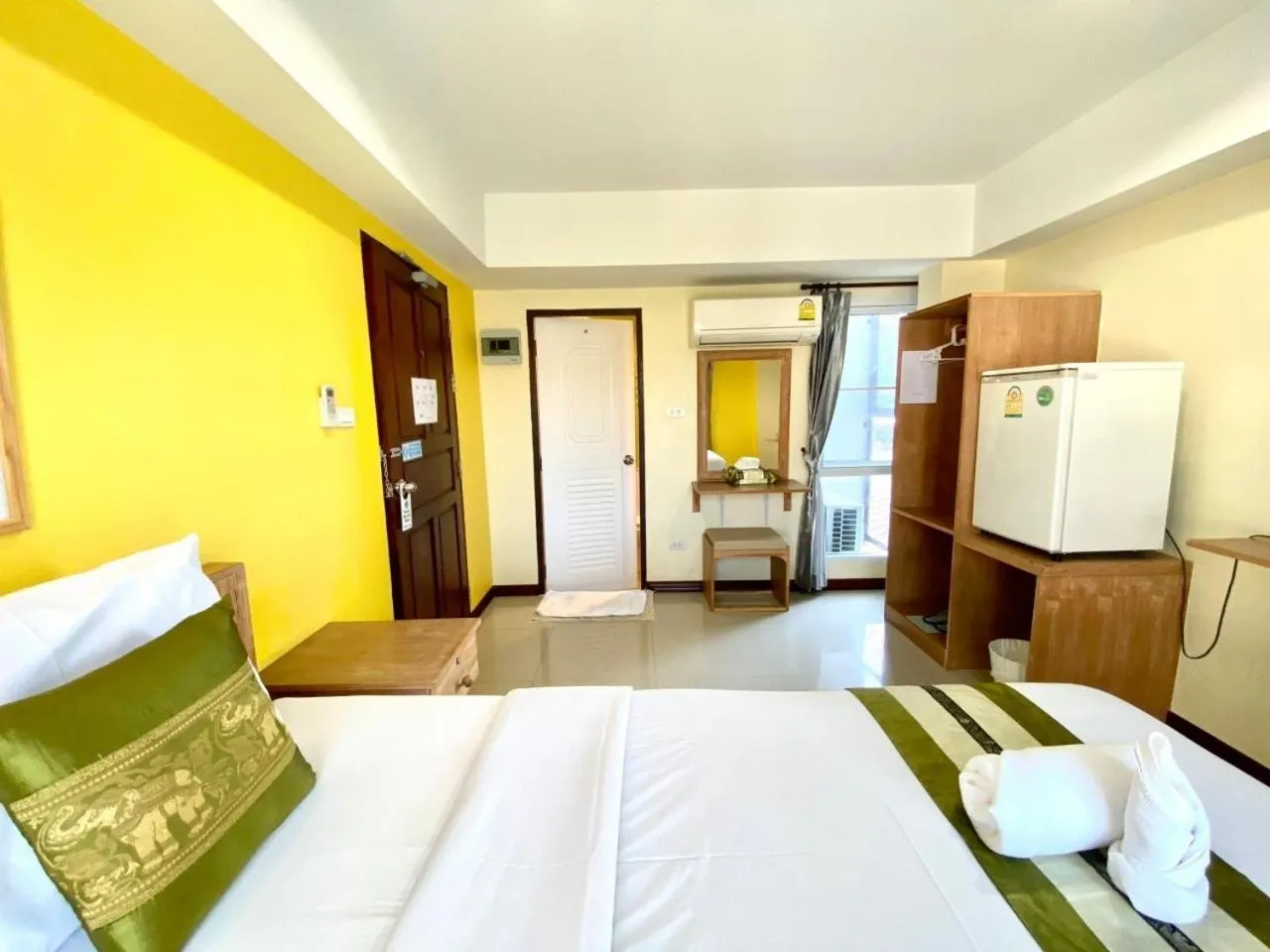 Photo of the whole room, Bed in Chinda Boutique Hotel