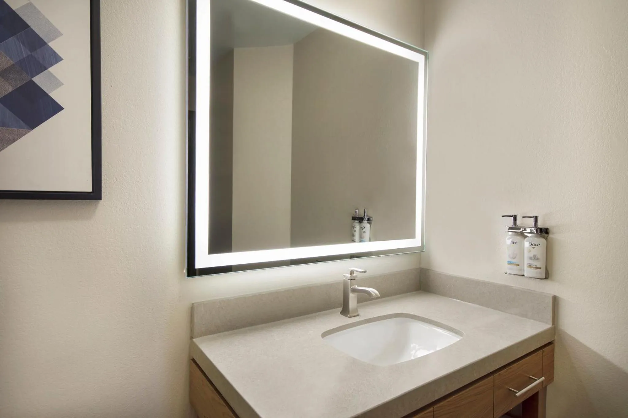 Bathroom in Candlewood Suites Buffalo Amherst by IHG