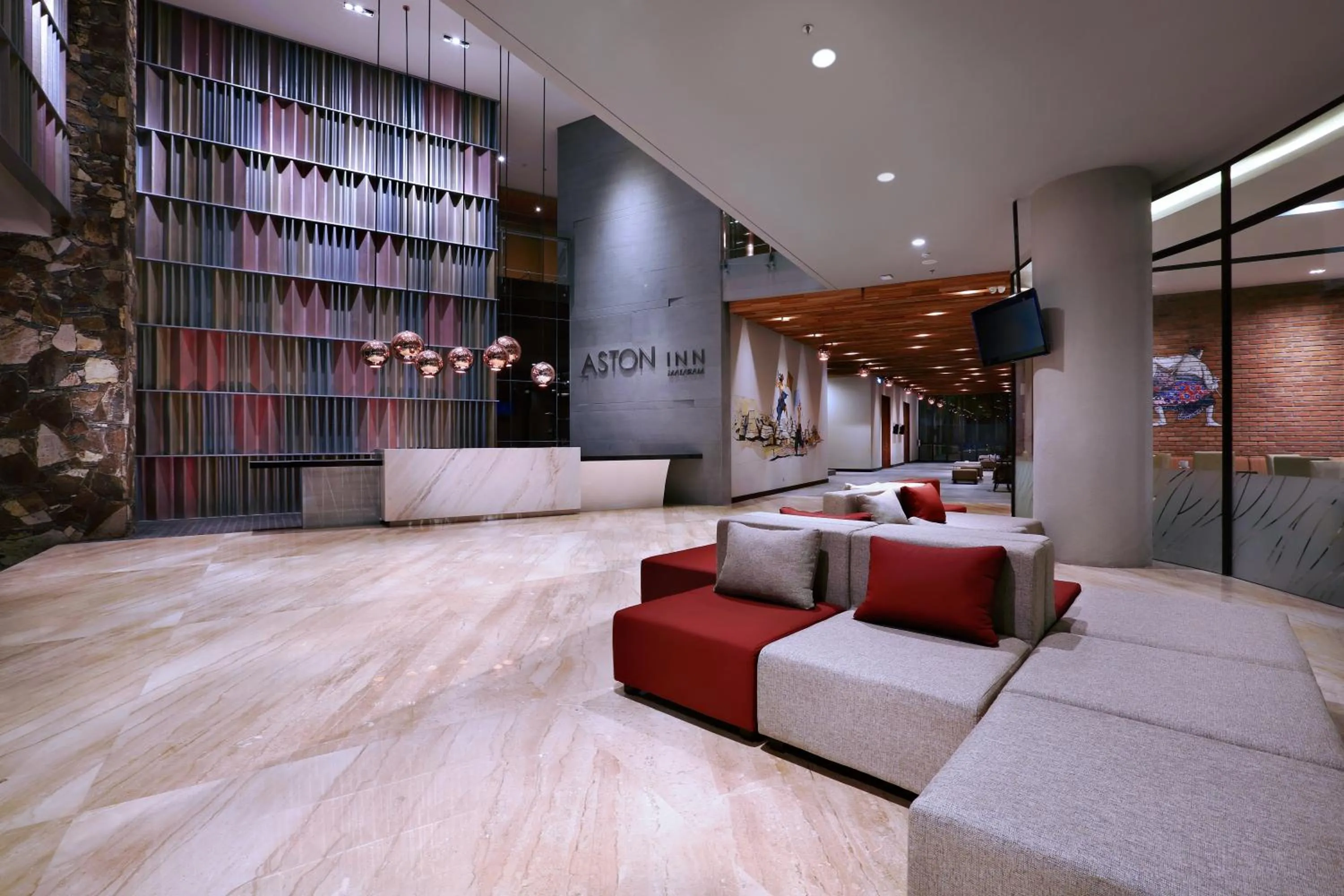 Lobby or reception in Aston Inn Mataram