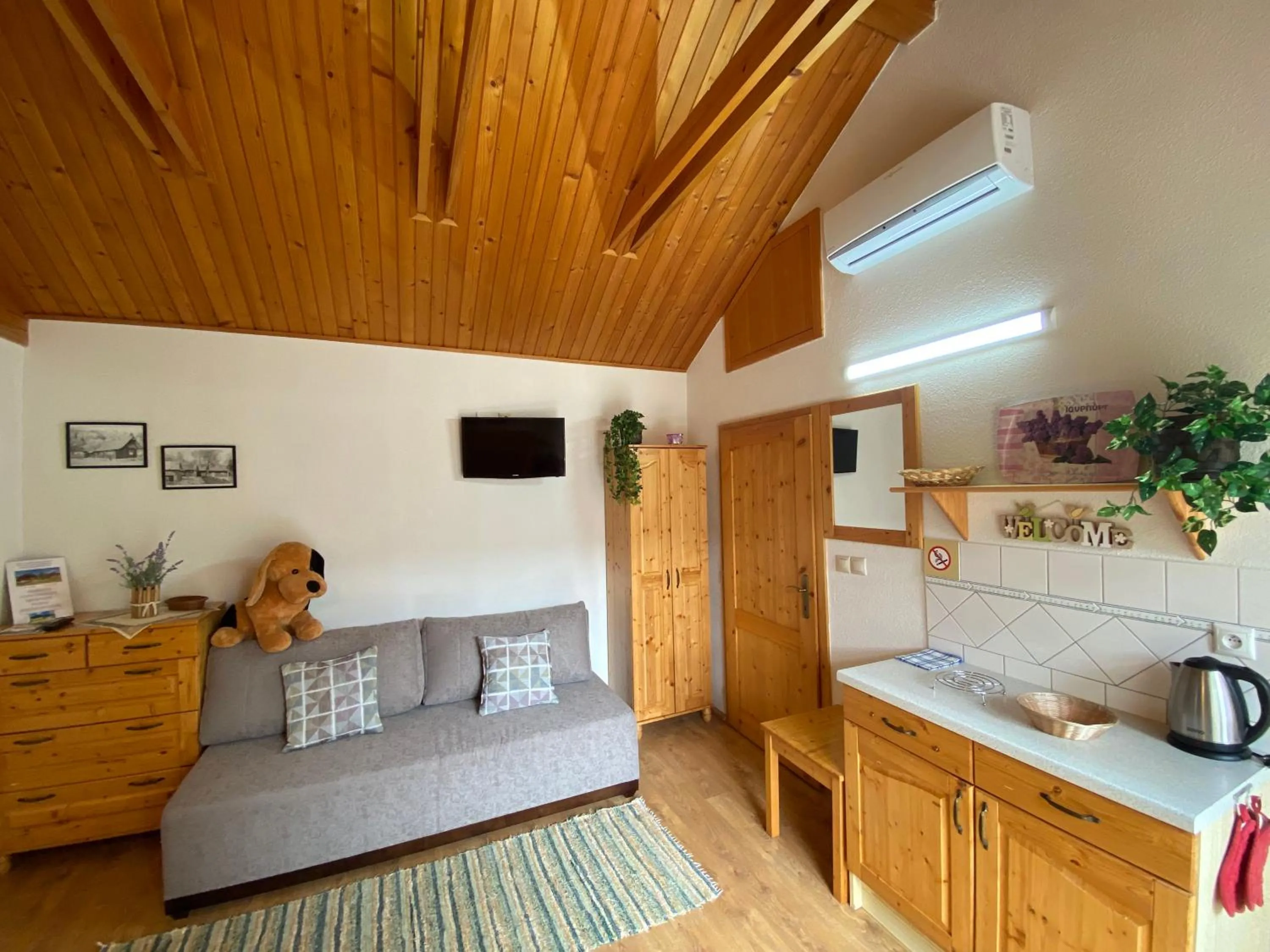 Living room, Bed in Tatralandia Chatky