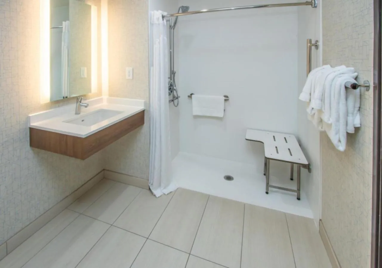 Shower in Holiday Inn Express Hotel & Suites Roseville - Galleria Area by IHG