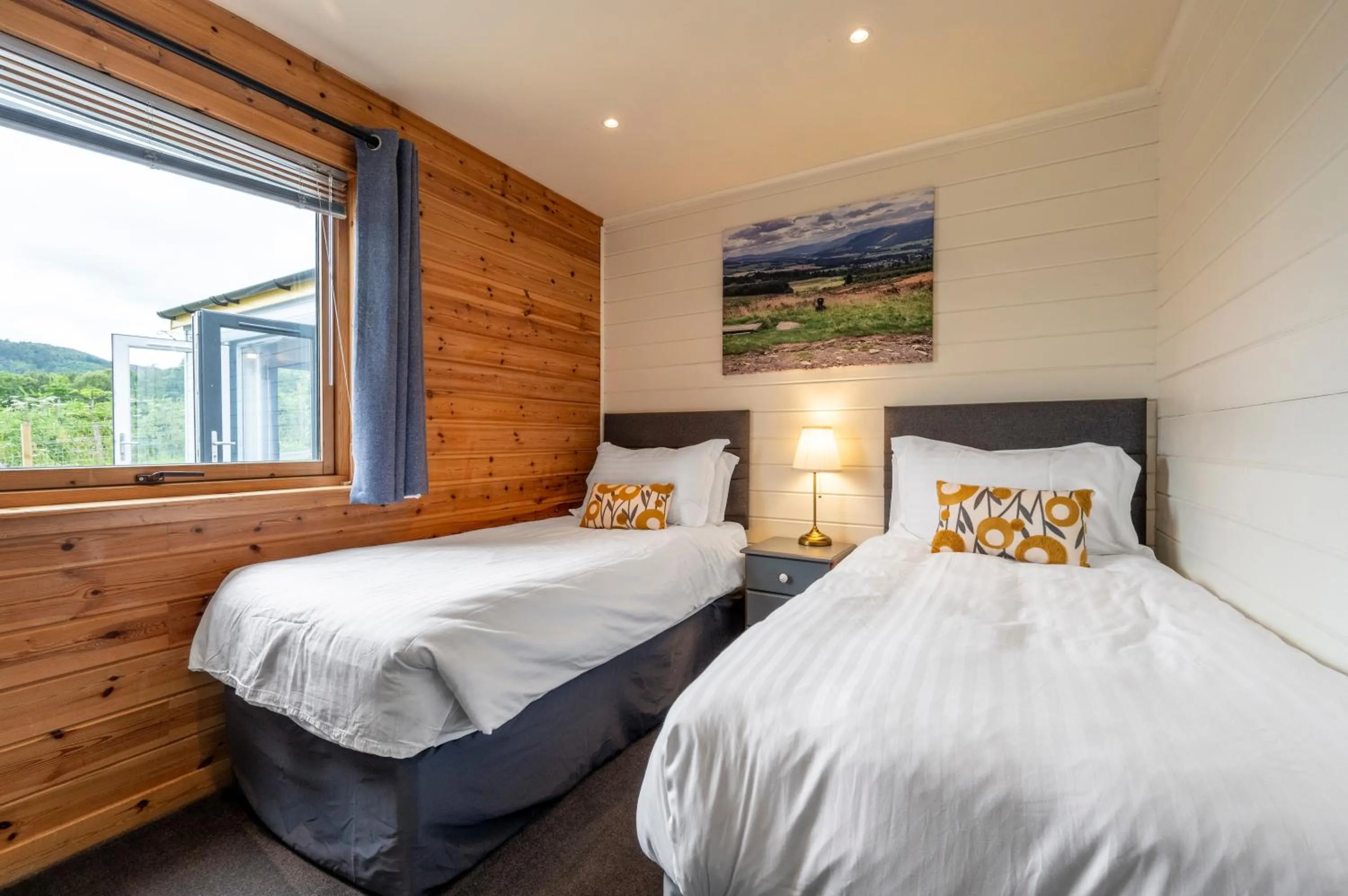 Bed in Kinnaird Woodland Lodges