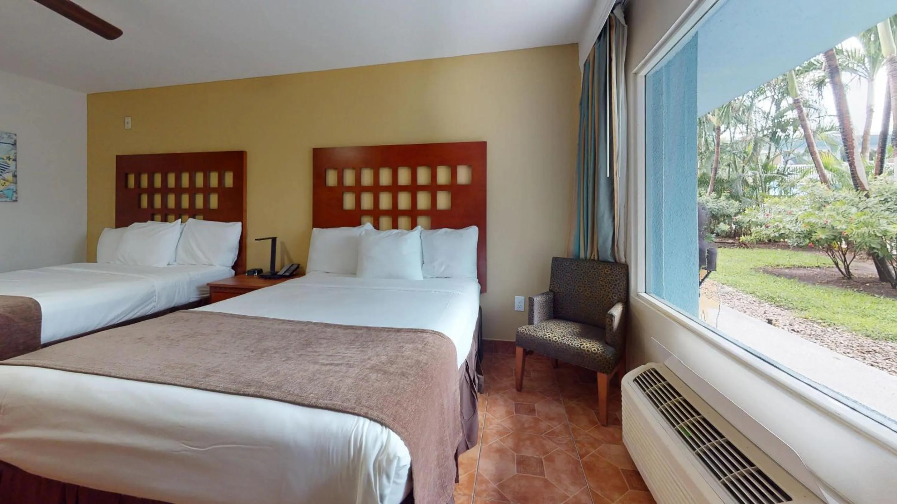 Deluxe Queen Room with Two Queen Beds - Non-Smoking in Rodeway Inn & Suites Fort Lauderdale Airport & Cruise Port