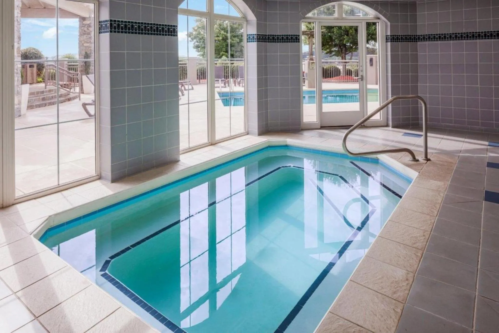 Swimming pool in Holiday Inn Express & Suites Asheville SW - Outlet Ctr Area by IHG