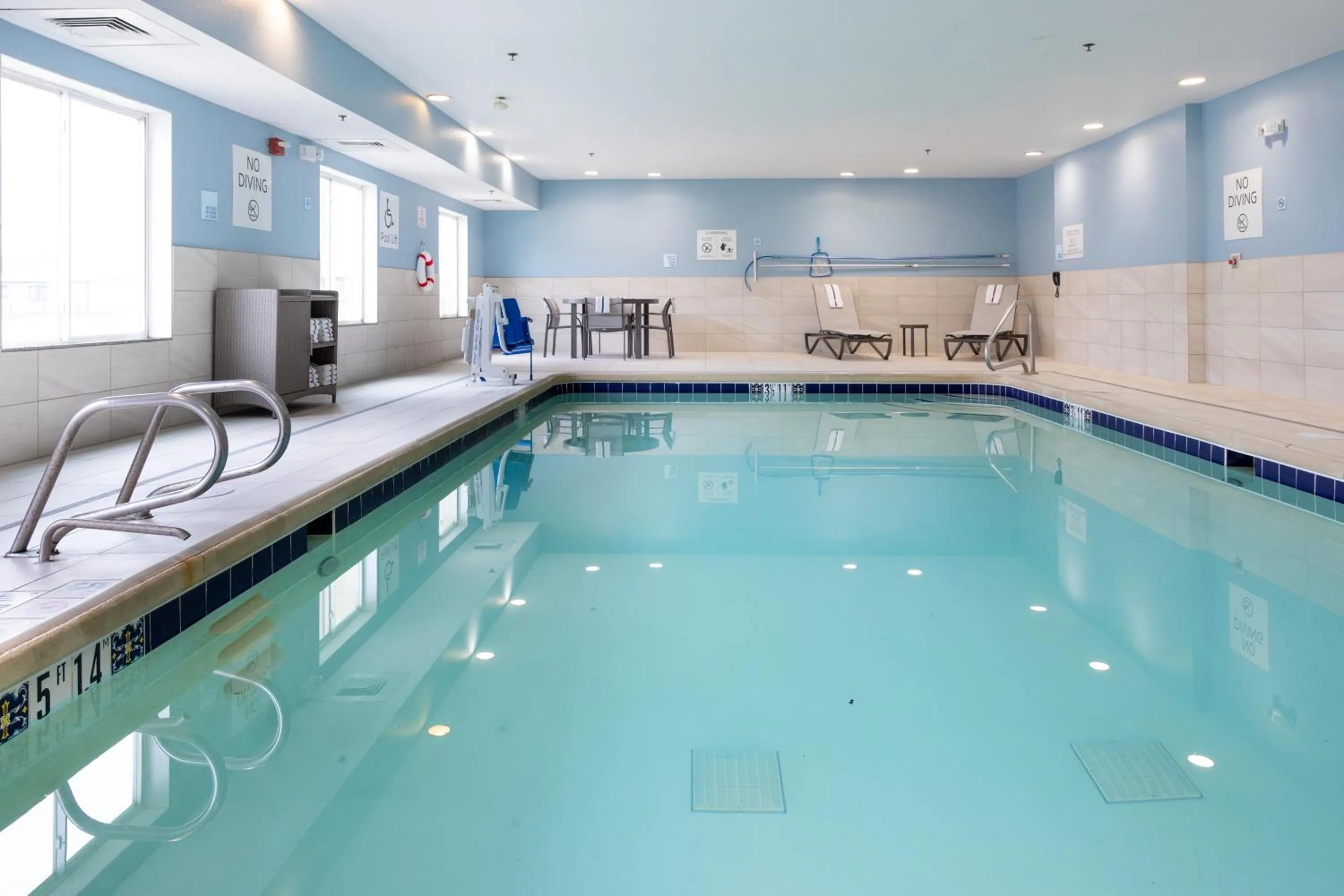 Swimming pool in Holiday Inn Express Hotel & Suites Wichita Airport by IHG