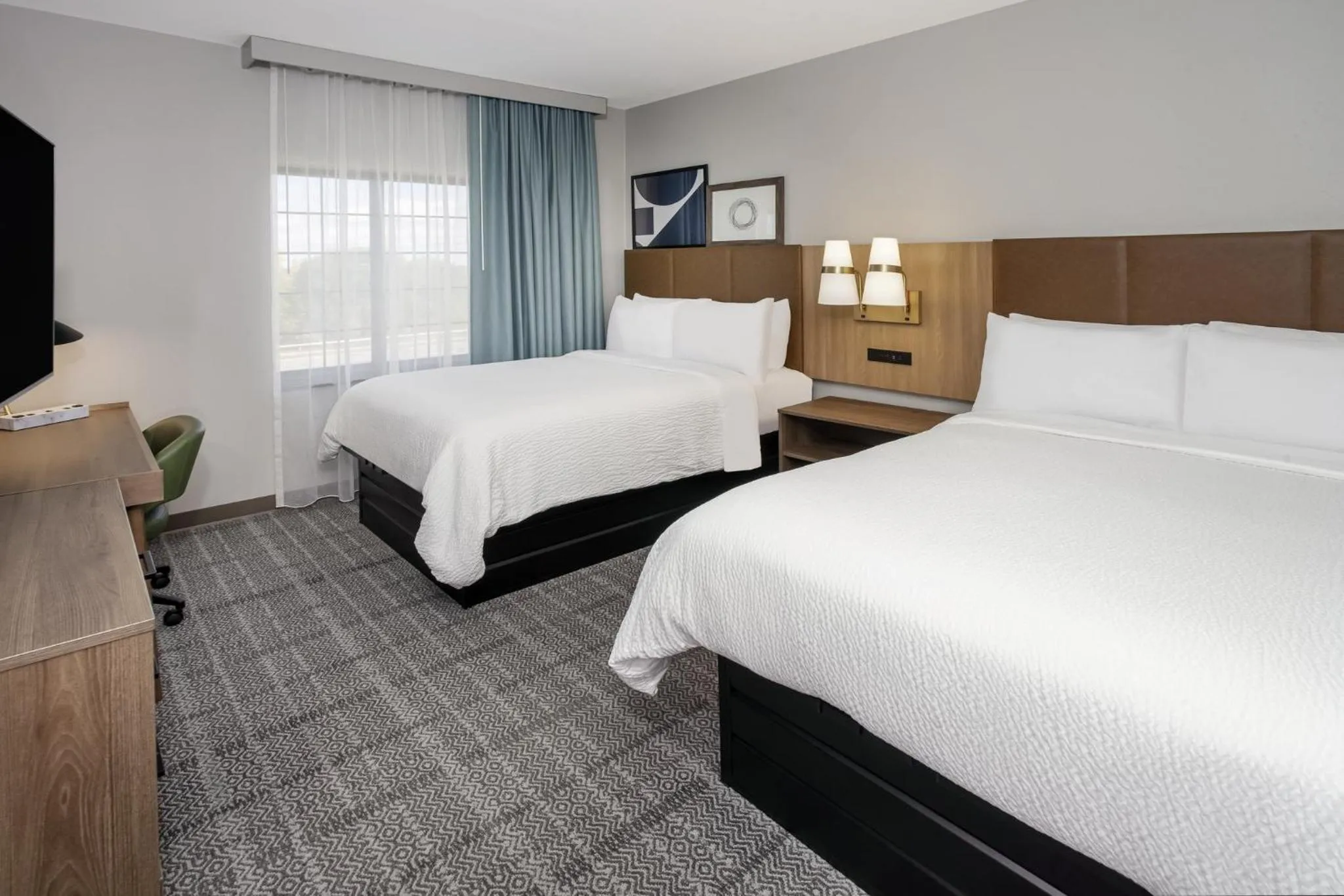Photo of the whole room, Bed in Staybridge Suites Williamsville Buffalo by IHG