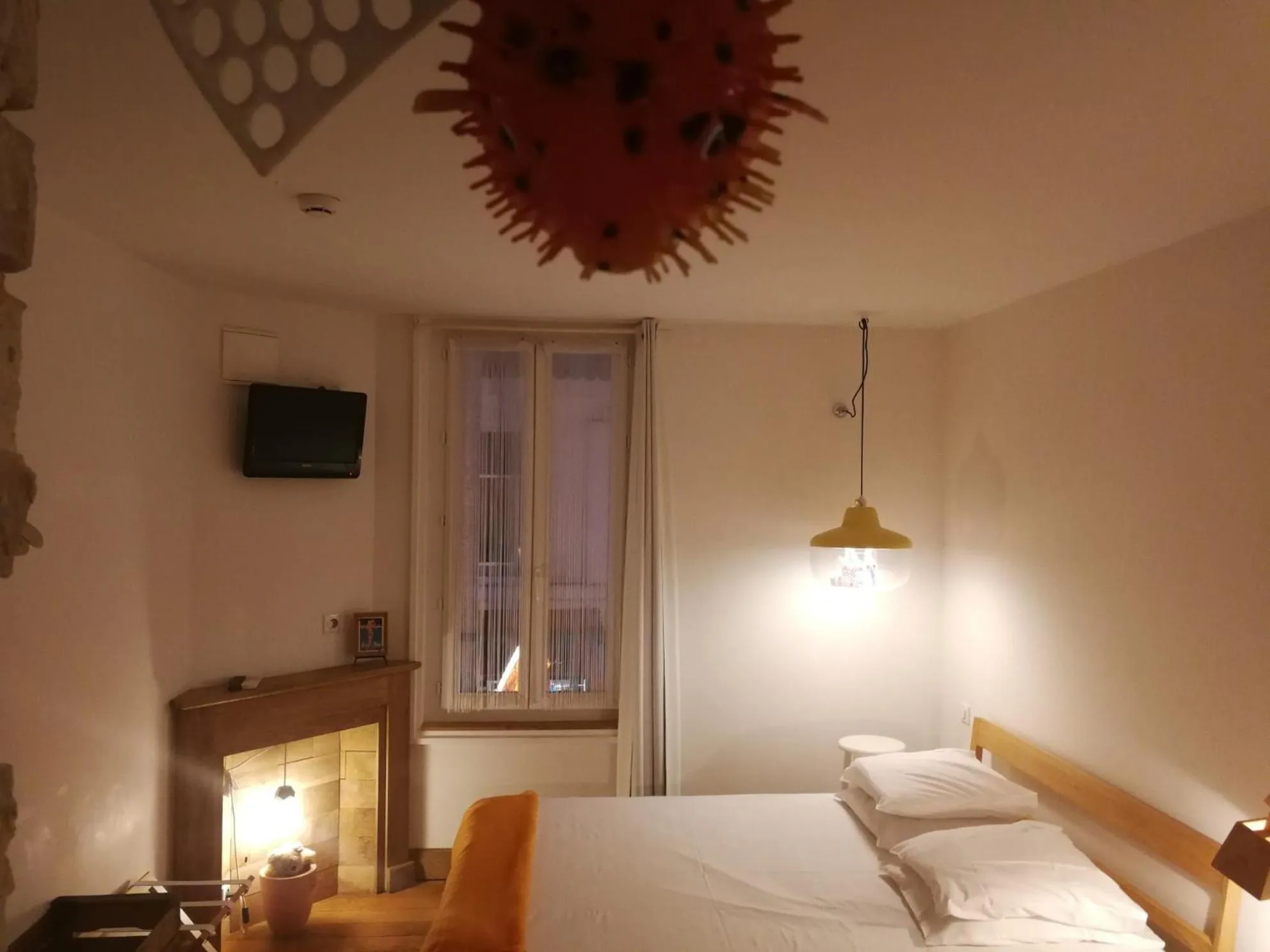 Photo of the whole room, Bed in Hôtel de la Pinède