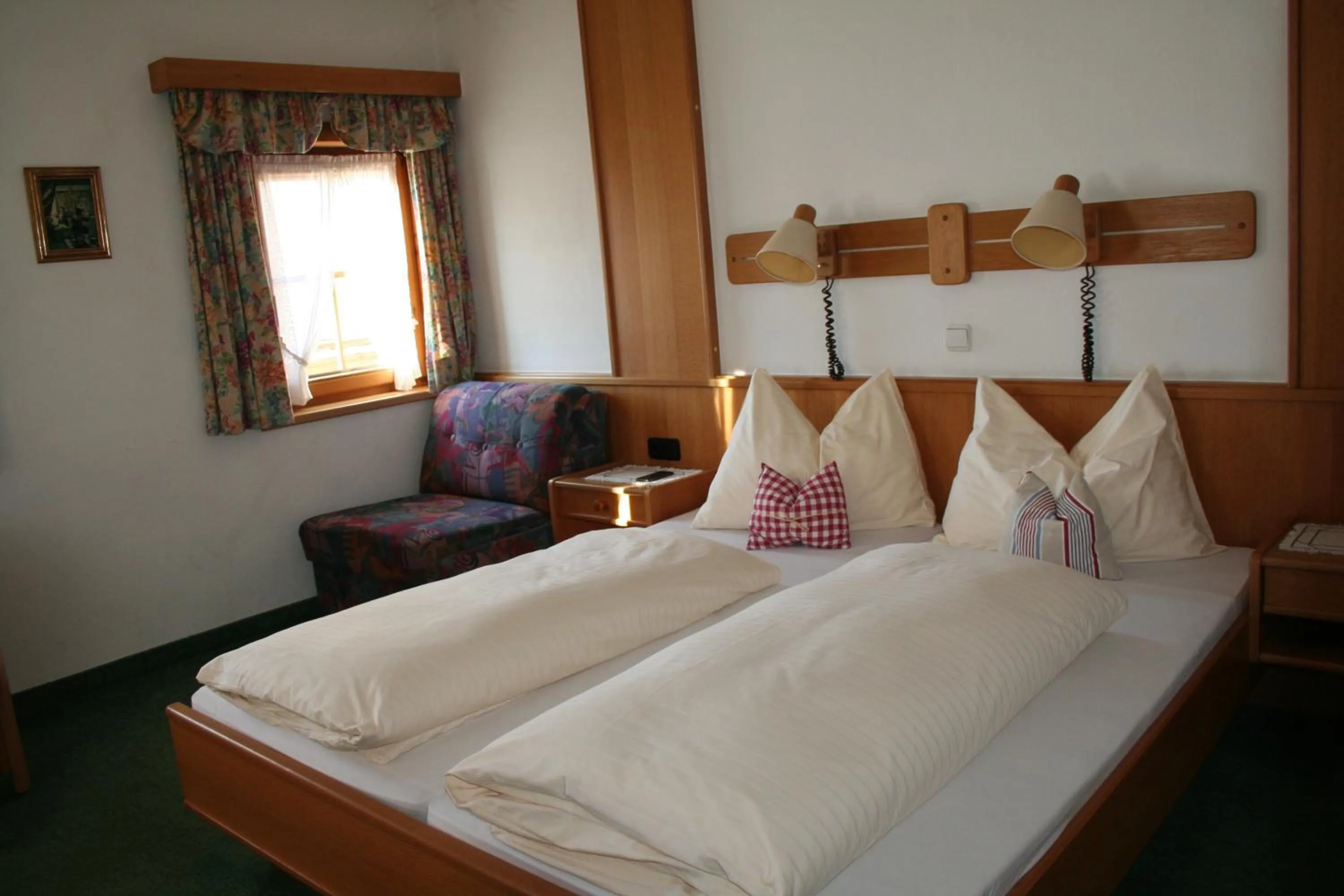 Photo of the whole room, Bed in Hotel Gasthof Schweizerhaus