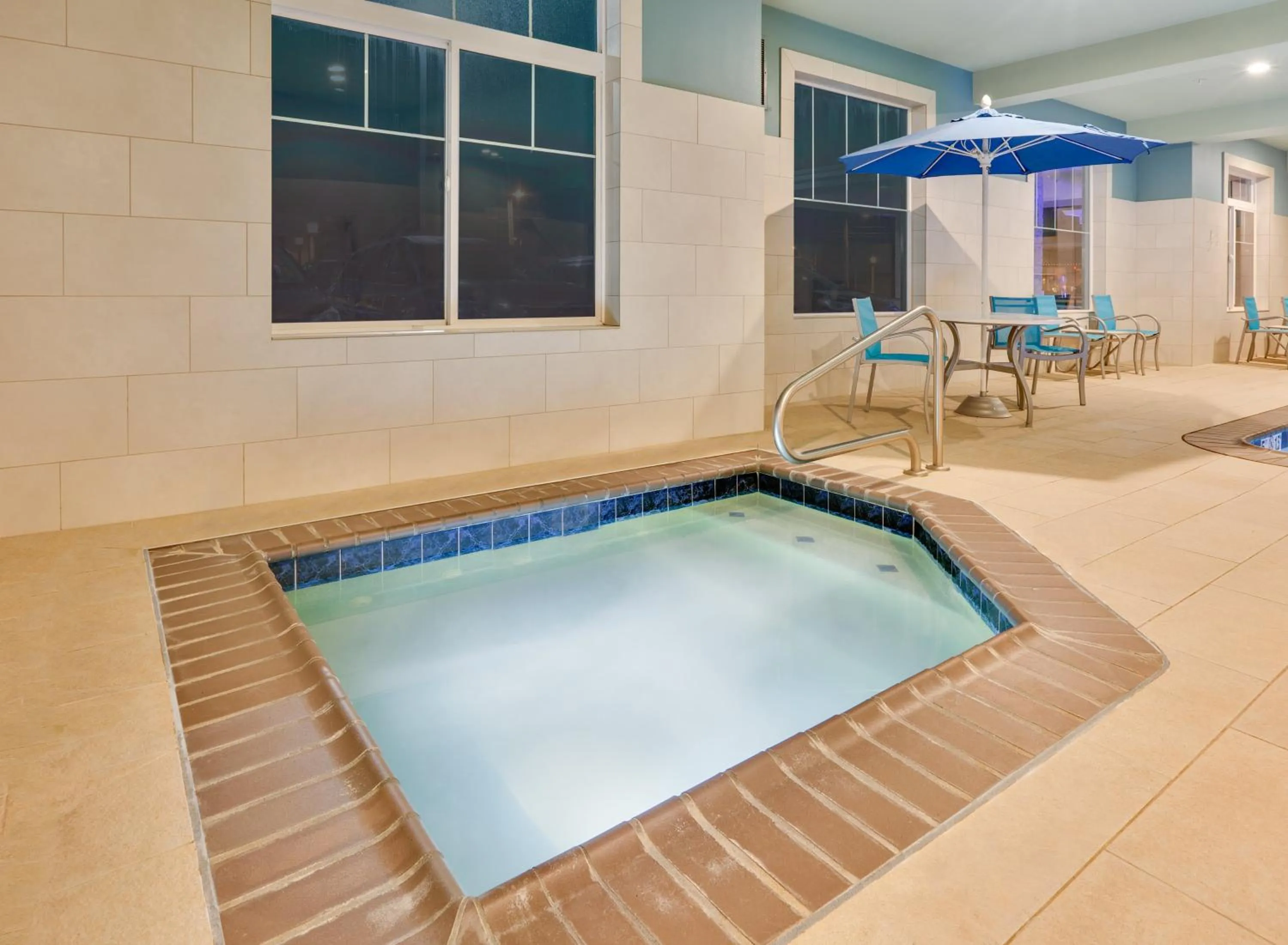 Swimming pool in Holiday Inn Express Hotel & Suites Seaside Convention Center by IHG