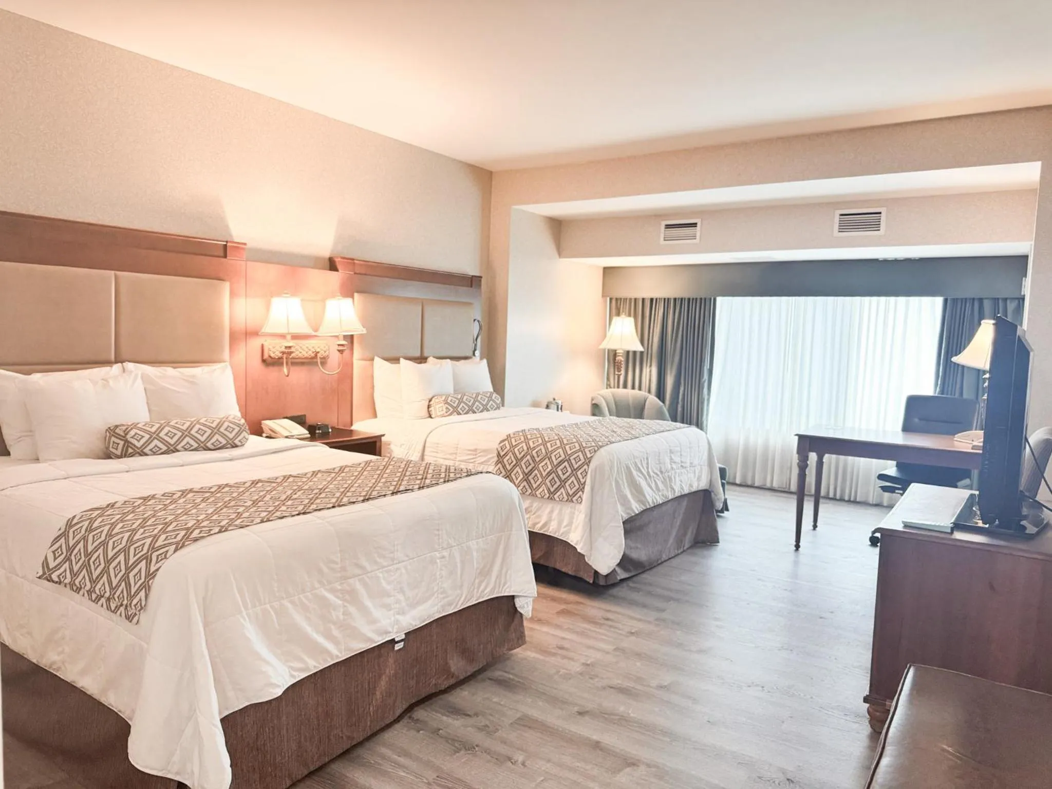 Bed in Clayton Plaza Hotel & Extended Stay