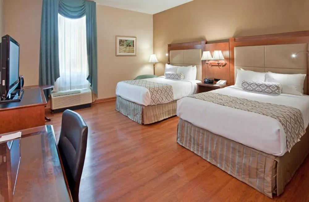 Bed in Clayton Plaza Hotel & Extended Stay