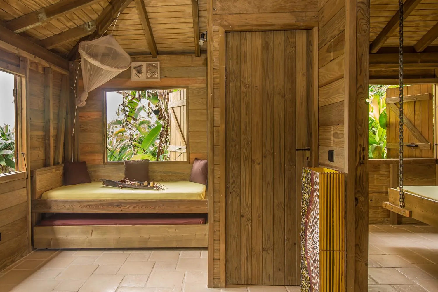 Bed in Iguana Ecolodge