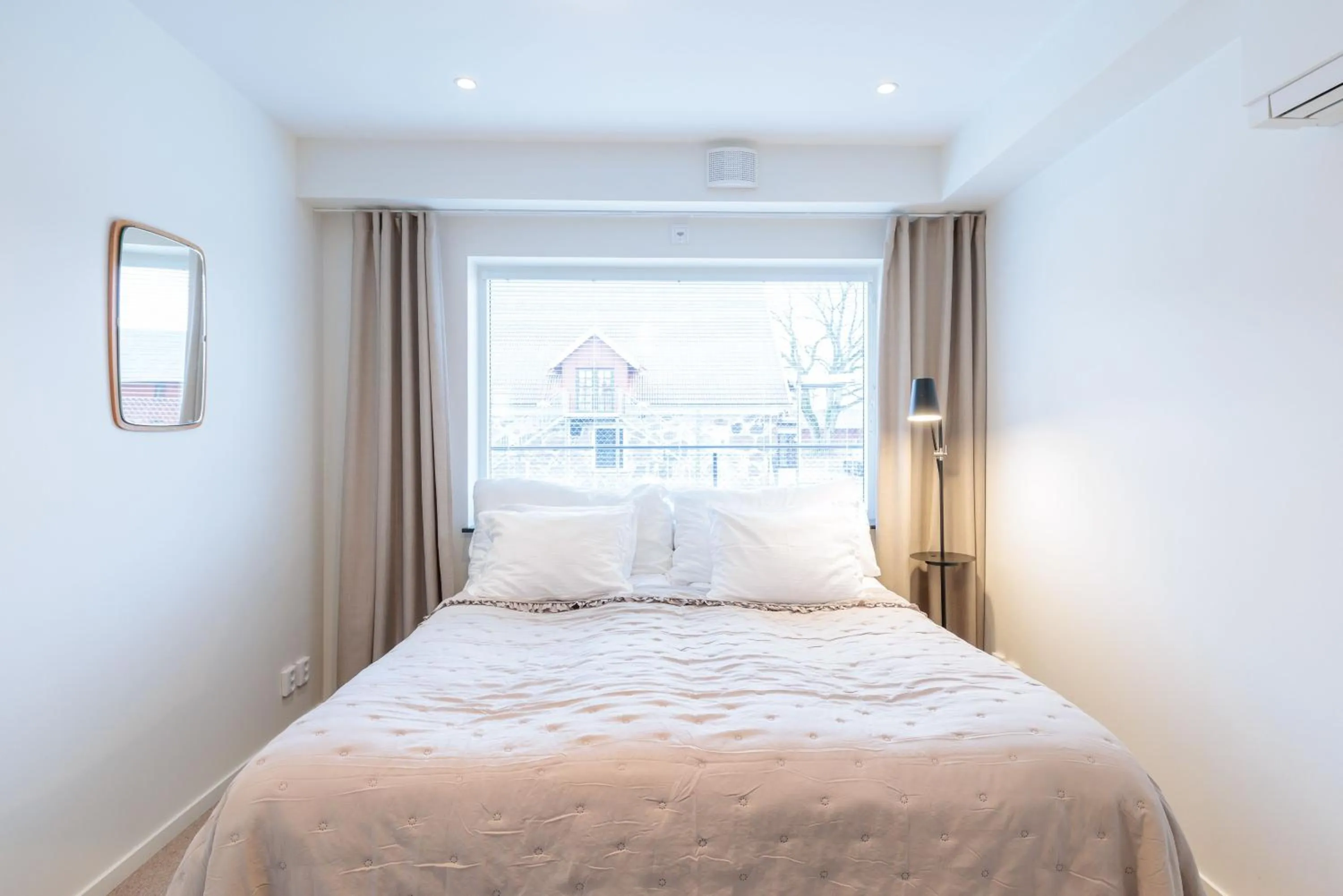 Bed in Easy Livin' Apartment Hotel