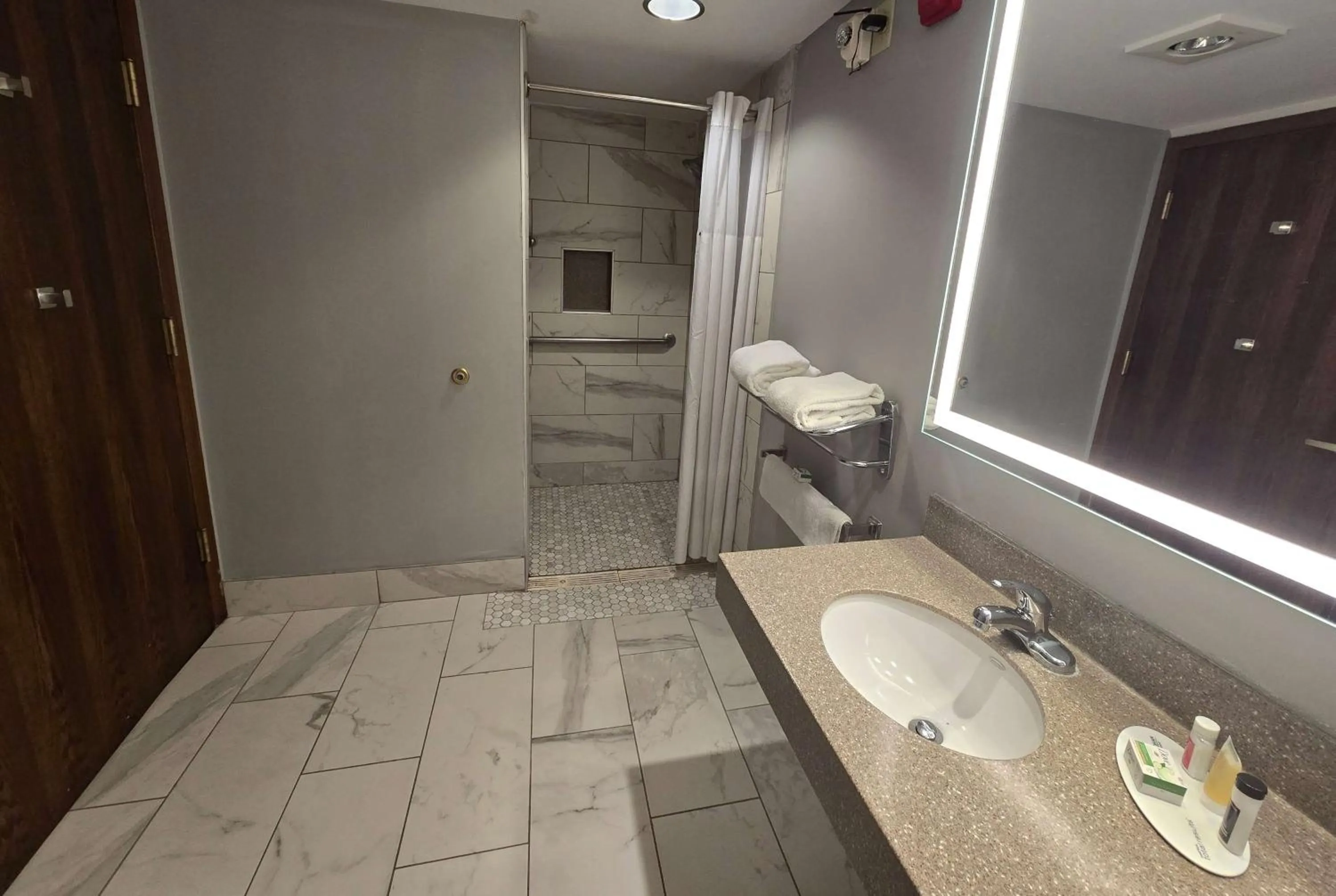 Shower in AmericInn by Wyndham Beloit