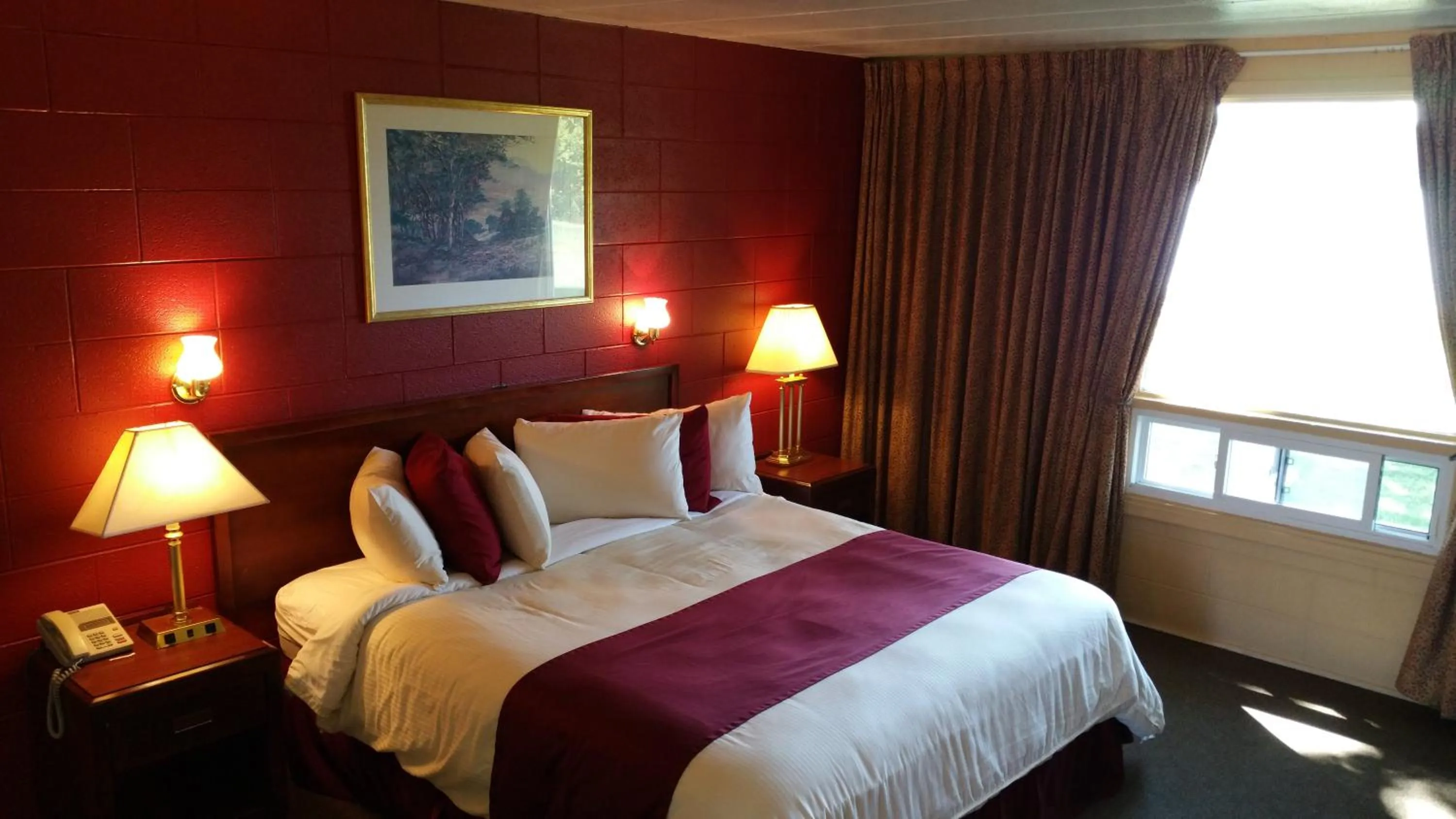 Bed in Riverview Motel