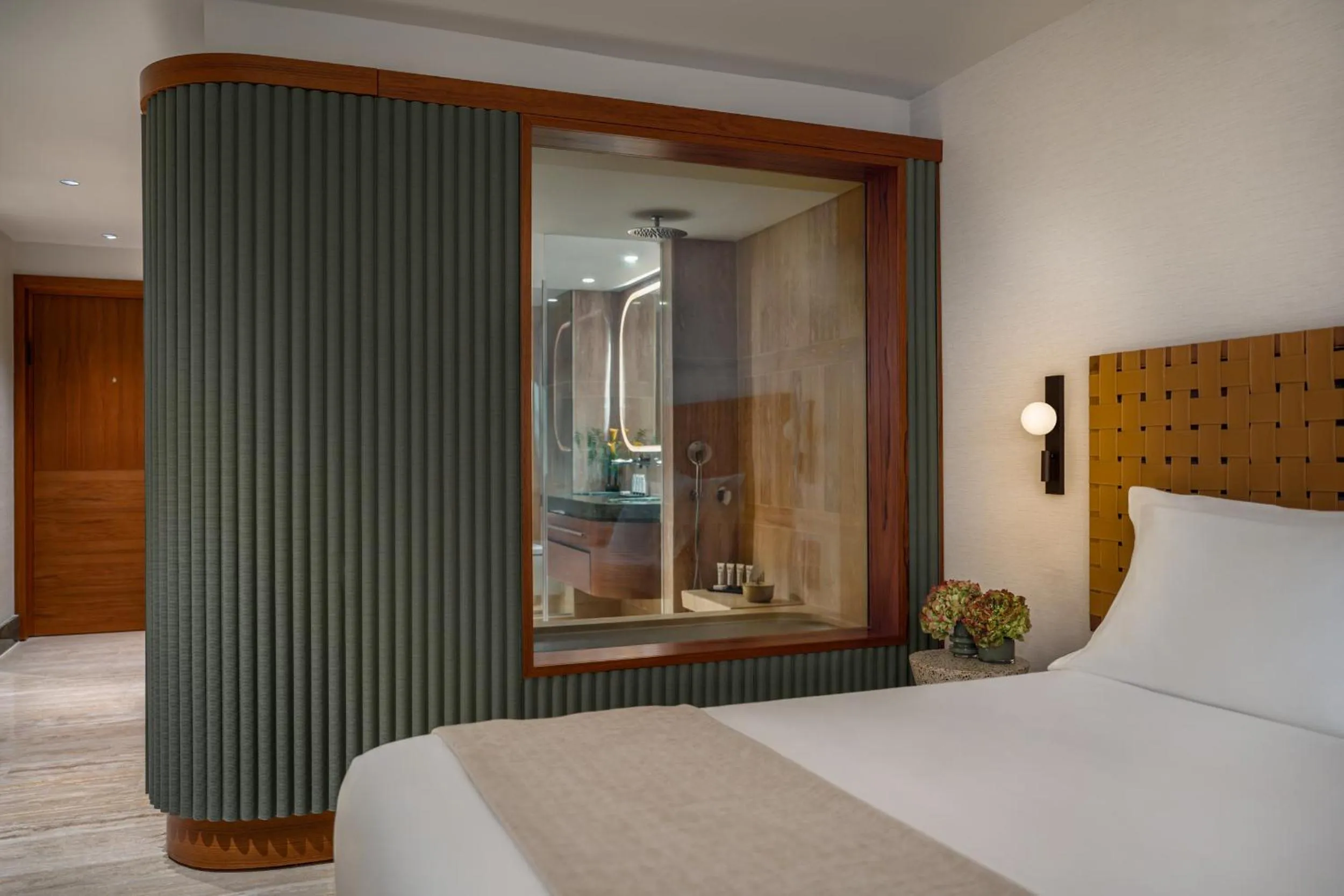 Bed in Dan Accadia Herzliya Hotel