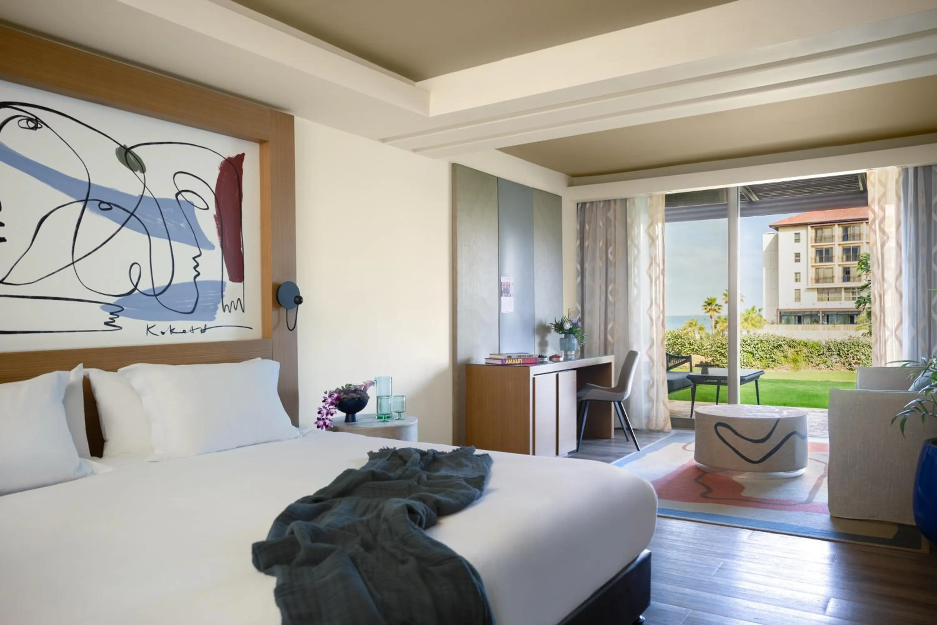 Bed in Dan Accadia Herzliya Hotel