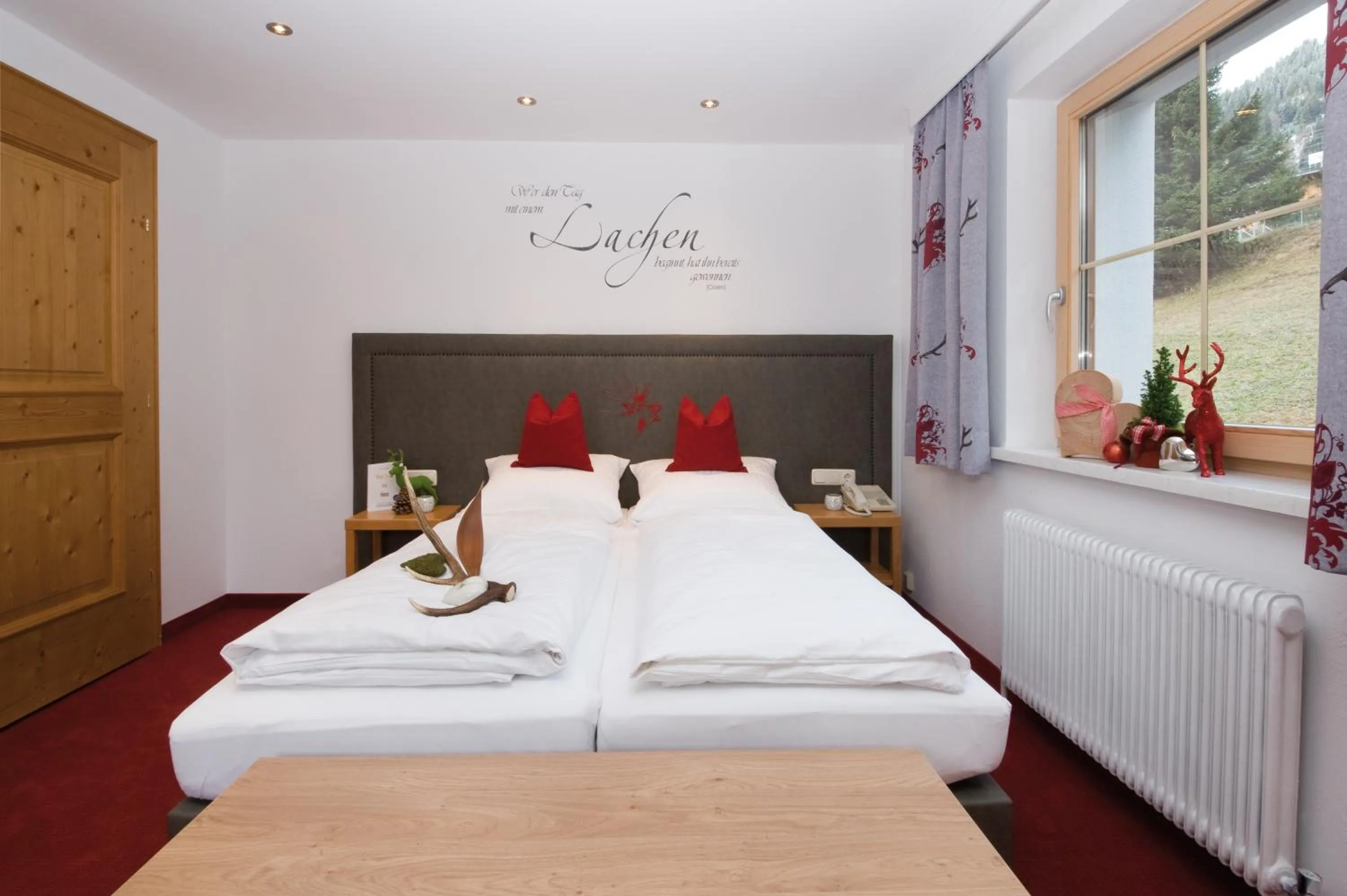 Photo of the whole room, Bed in Hotel Garni Rauch