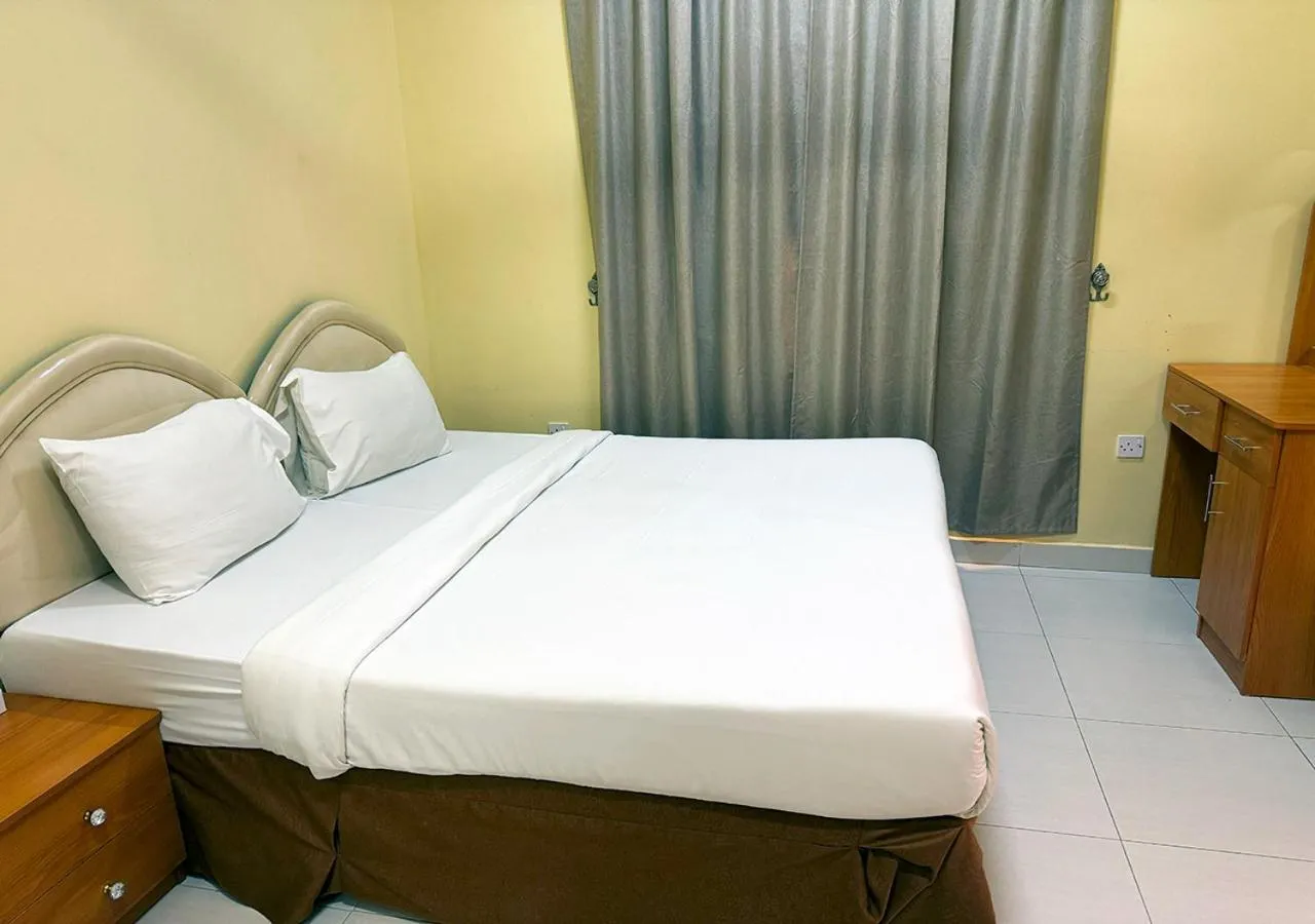 Bed in Jawharet Al Kheir Furnished Apartments