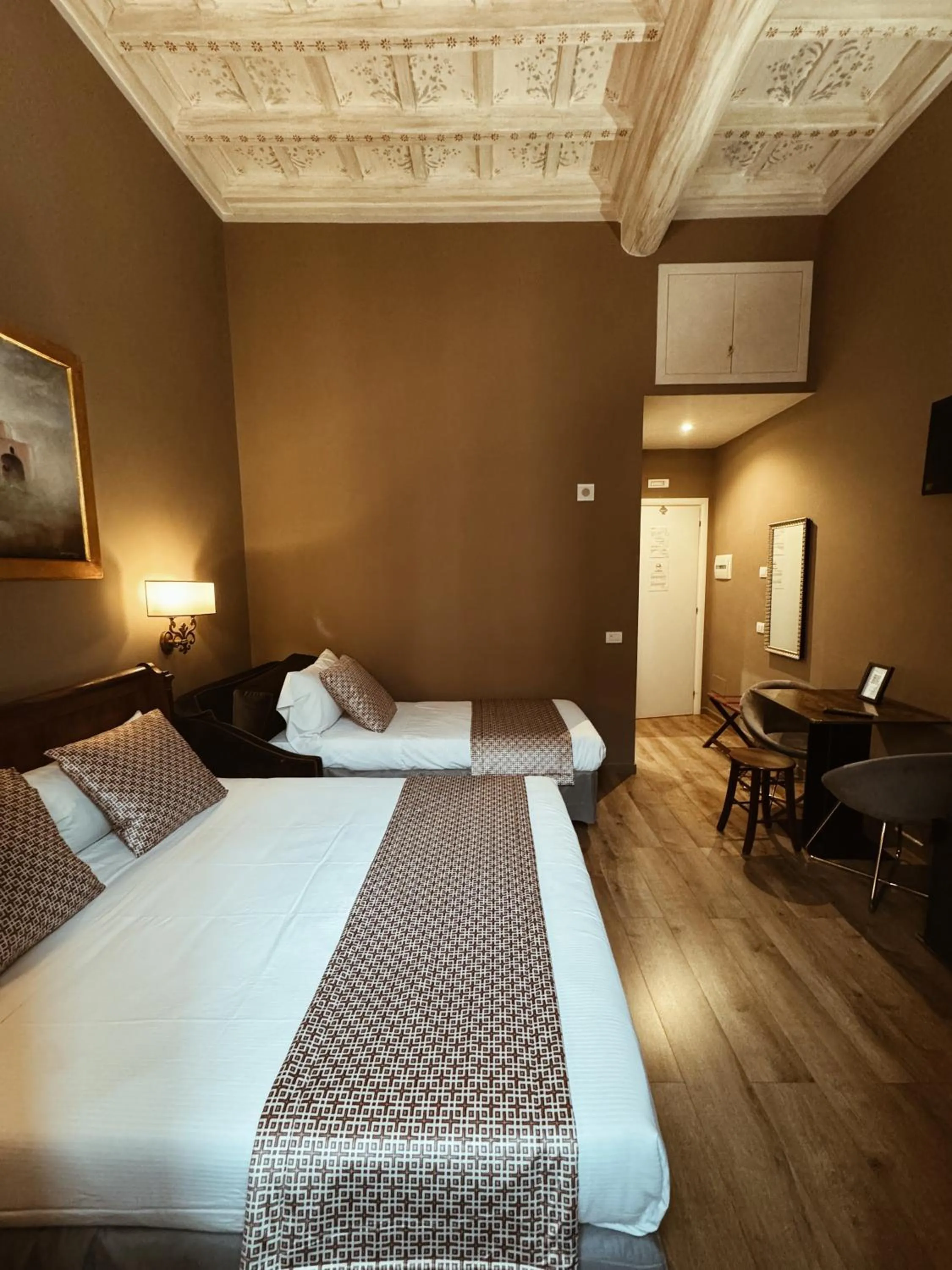 Bed in Residenza Sciarra Suites