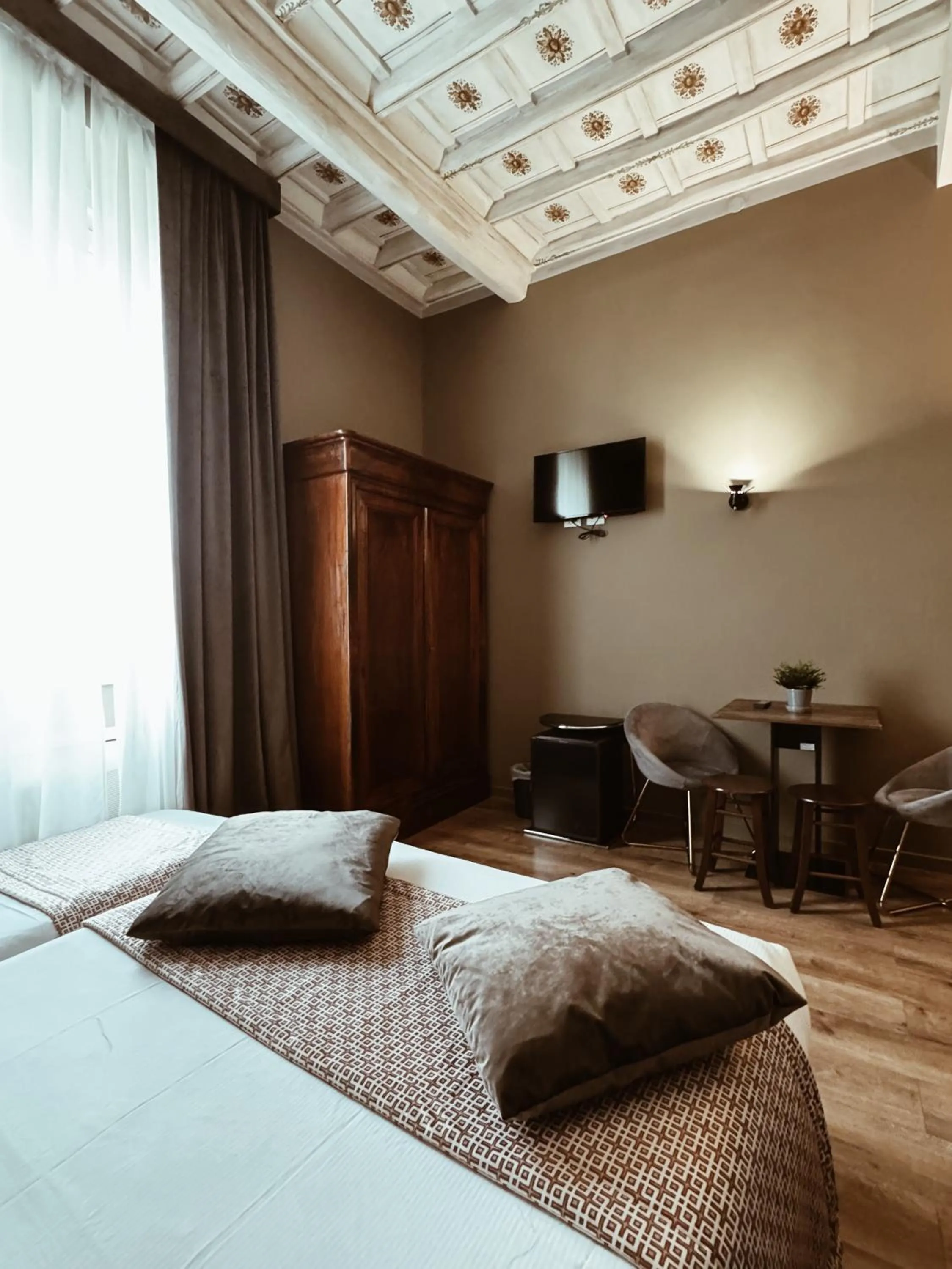 Bed in Residenza Sciarra Suites