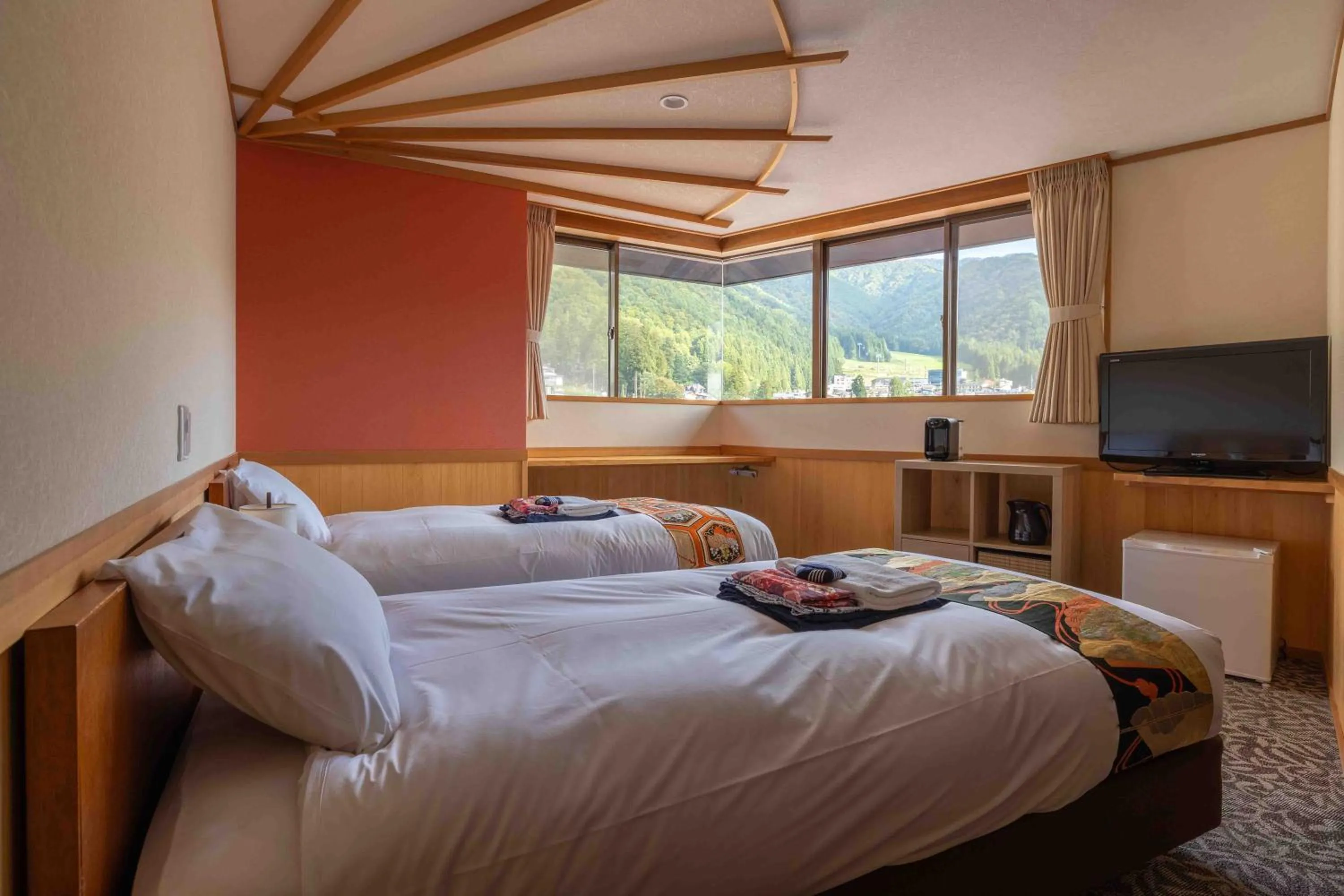 Bed in Nozawa View Hotel Shimataya