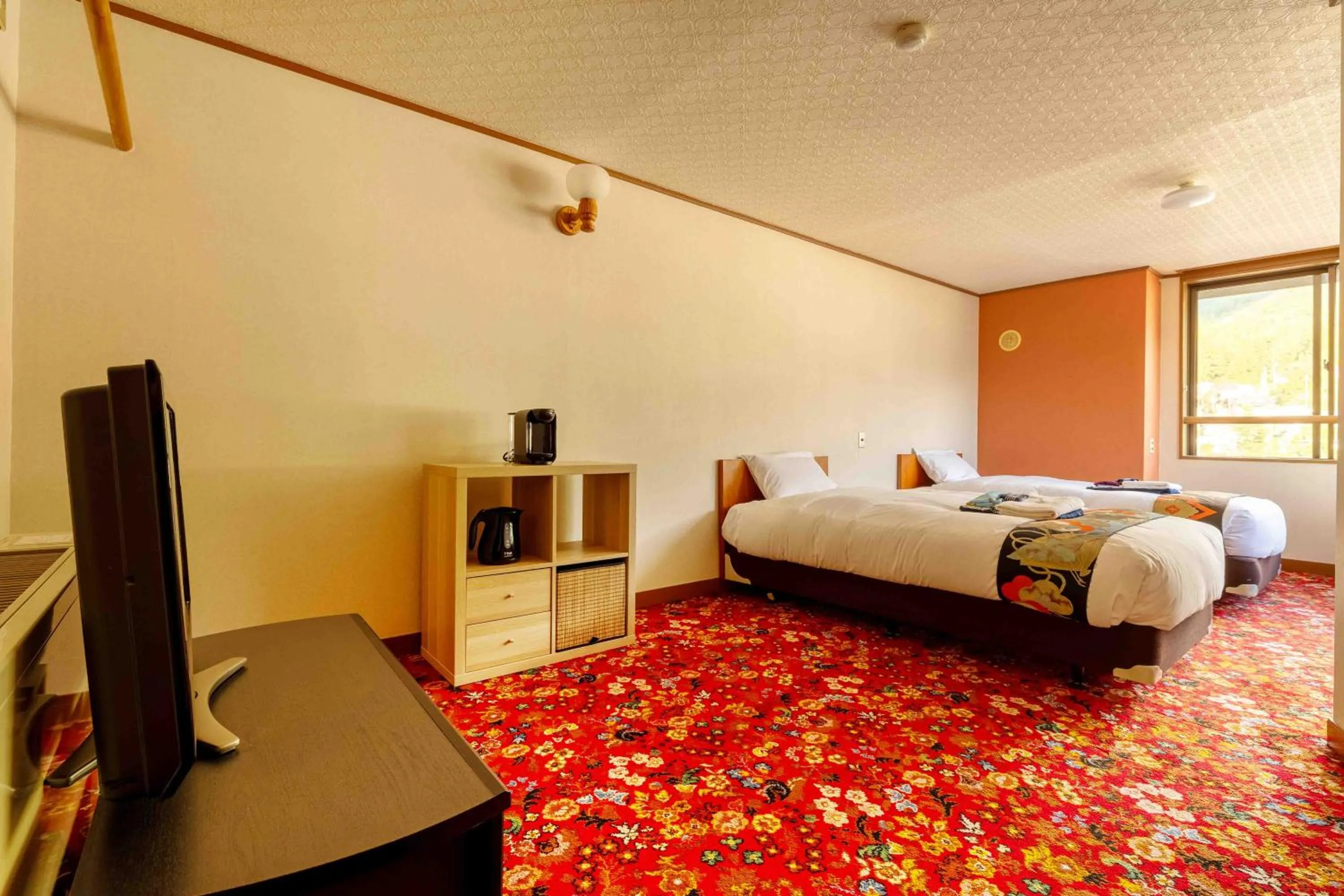 Bed in Nozawa View Hotel Shimataya