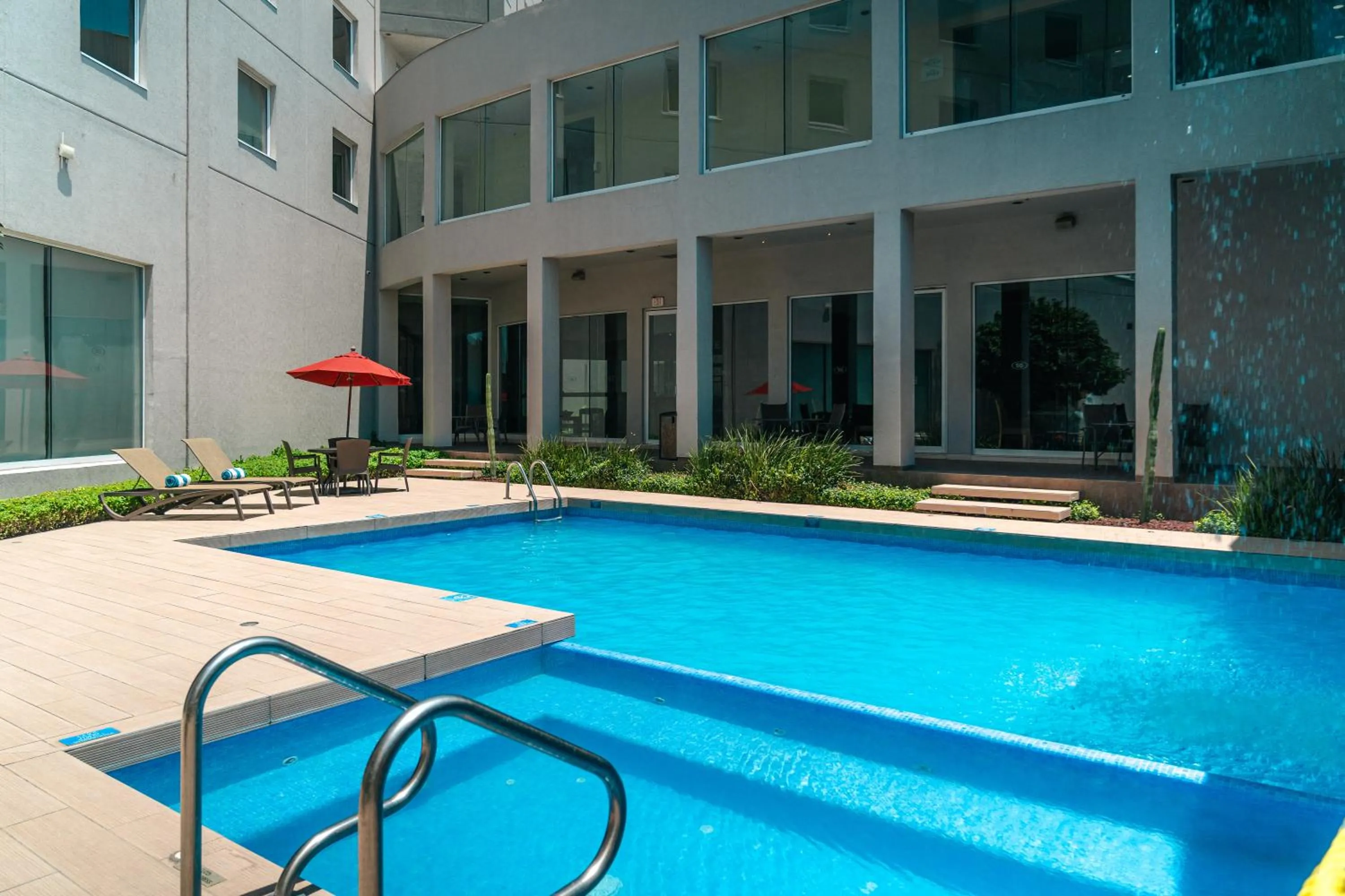 Swimming pool in Crowne Plaza Monterrey Aeropuerto by IHG