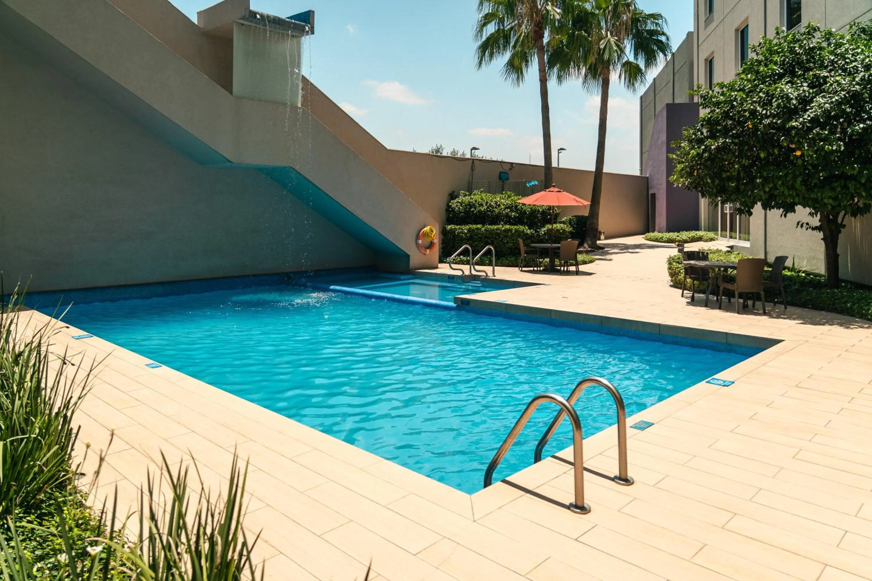 Swimming pool in Crowne Plaza Monterrey Aeropuerto by IHG
