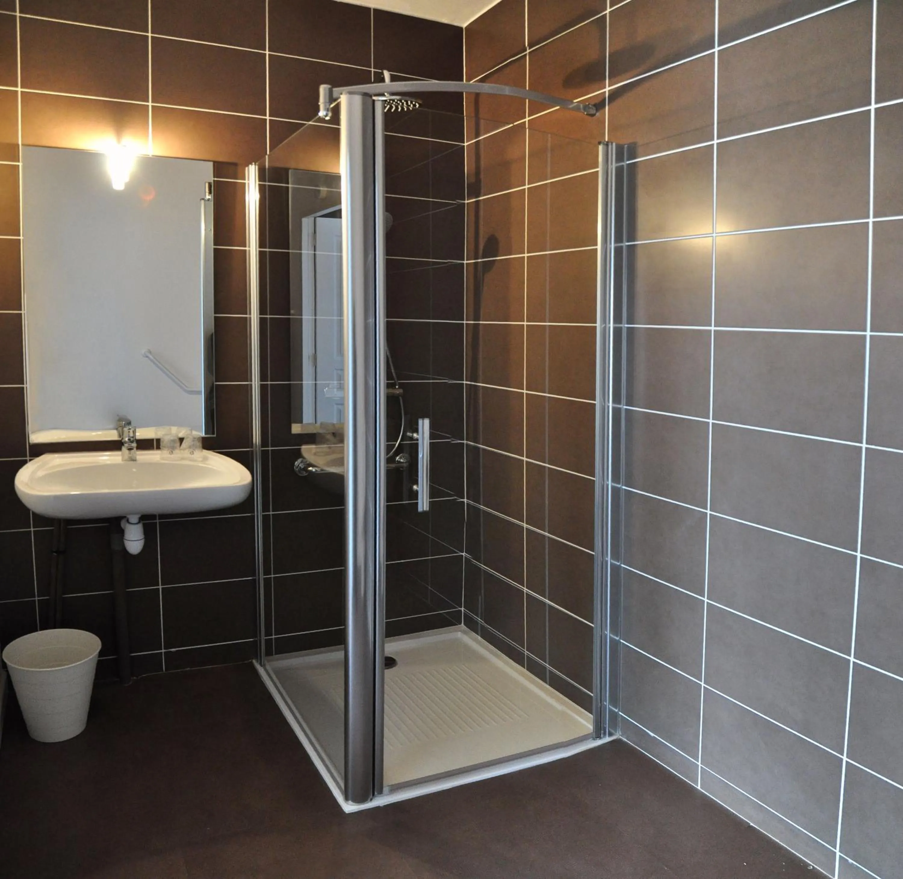 Bathroom in Golden Tulip Pornic Suites- Appart Hotel