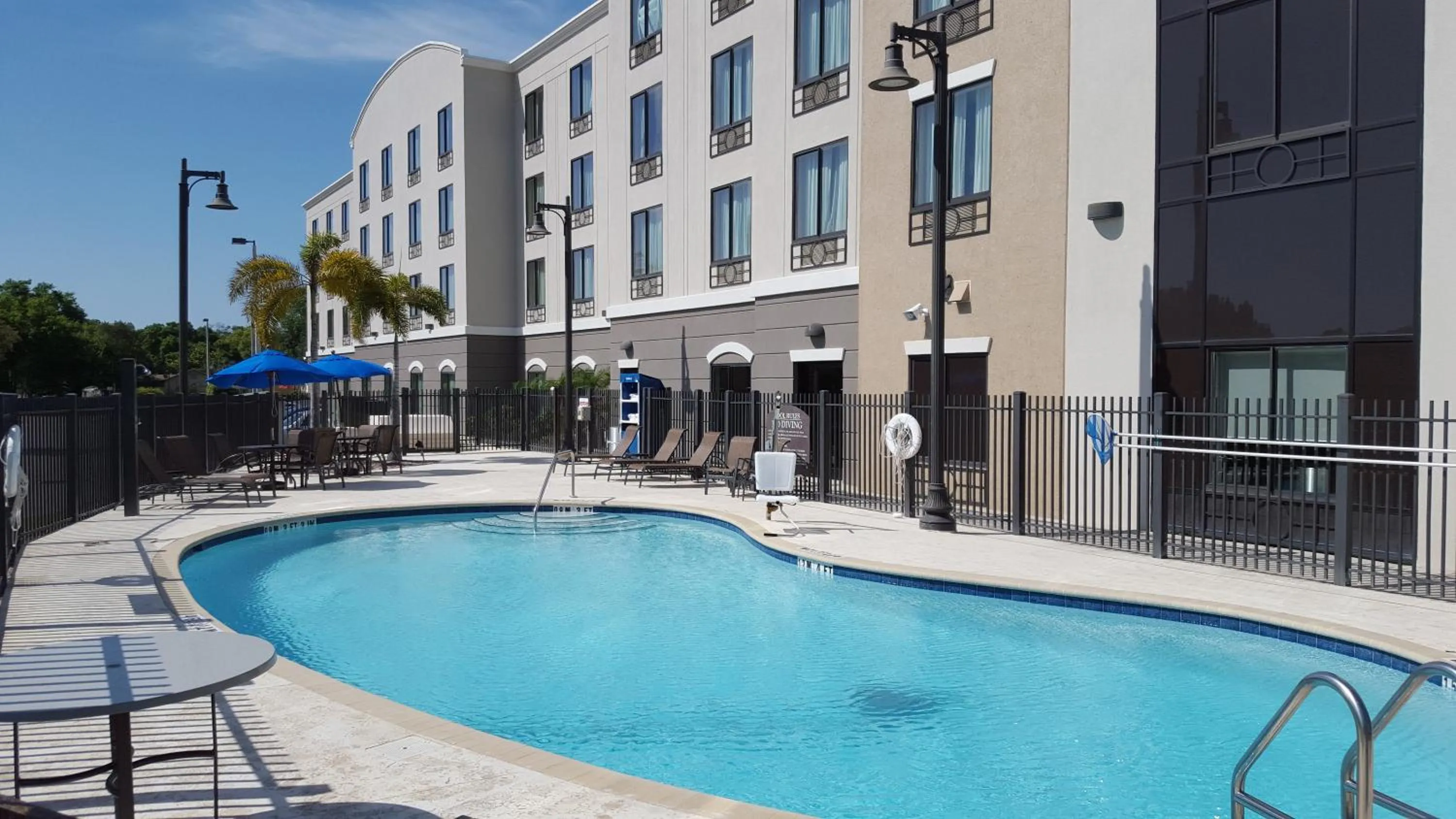 Swimming pool in Holiday Inn Express Hotel & Suites Tampa-USF-Busch Gardens by IHG