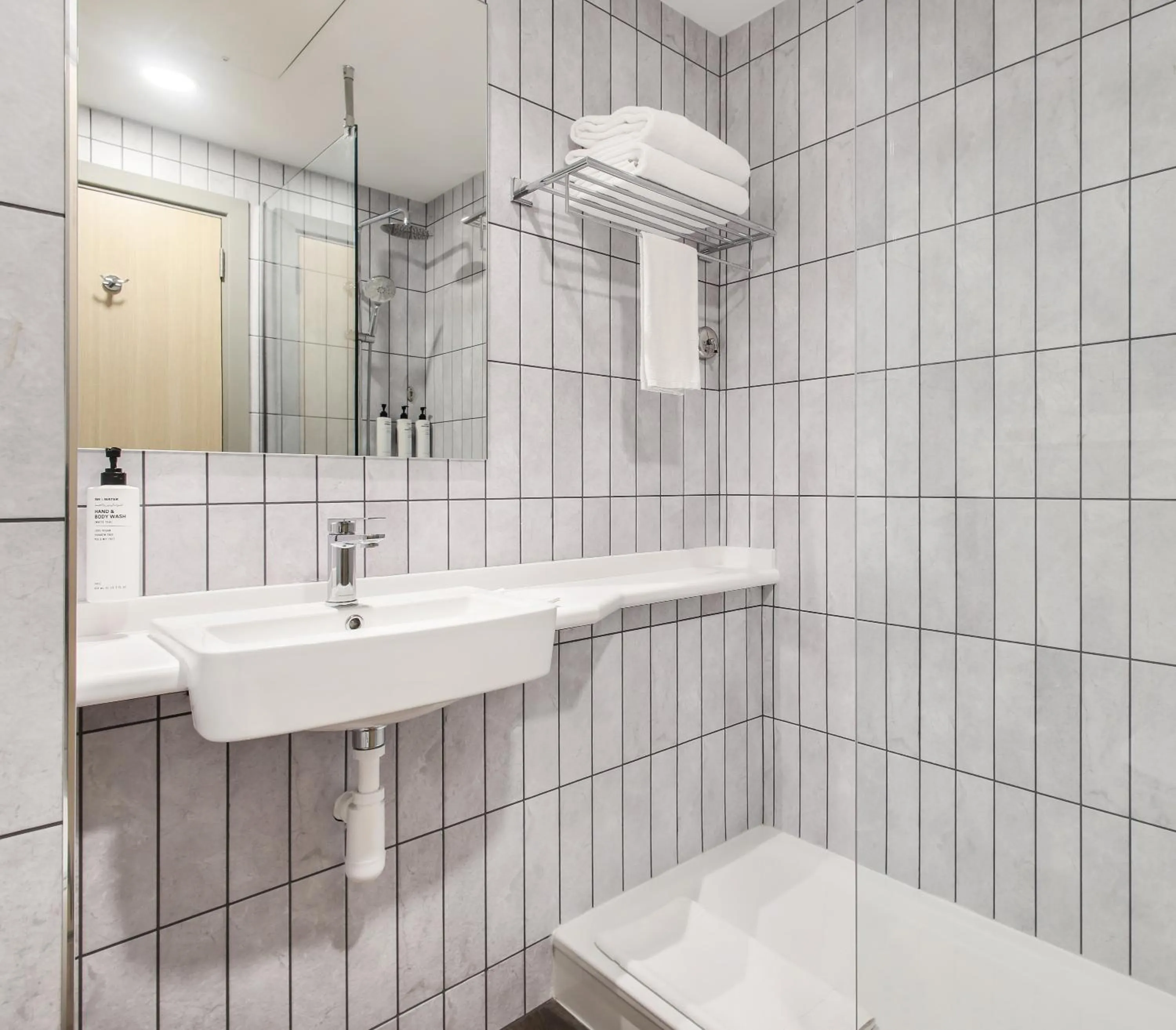 Shower in Premier Inn Dubai International Airport - An Emirates Group Company