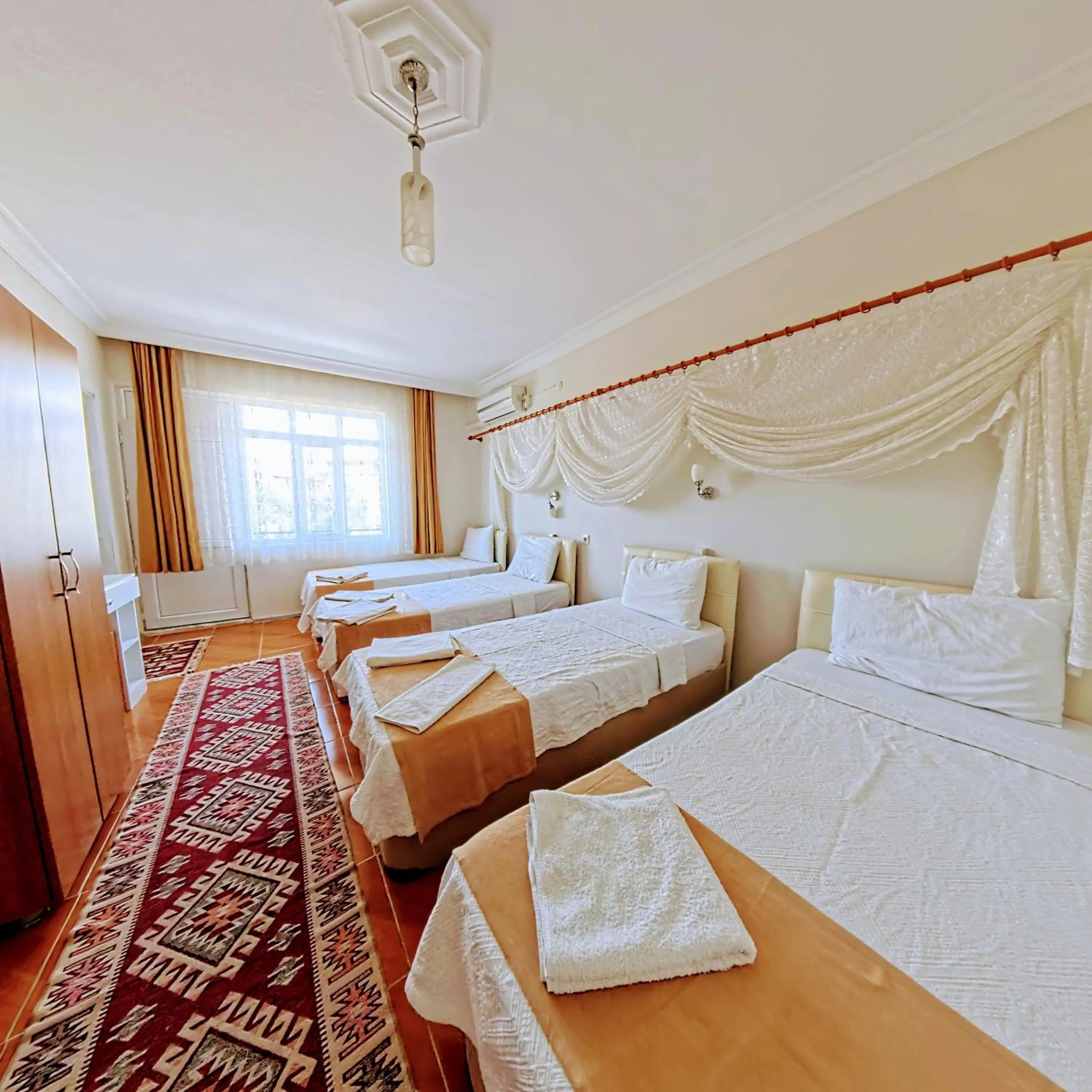 Bed in Kervansaray Hotel