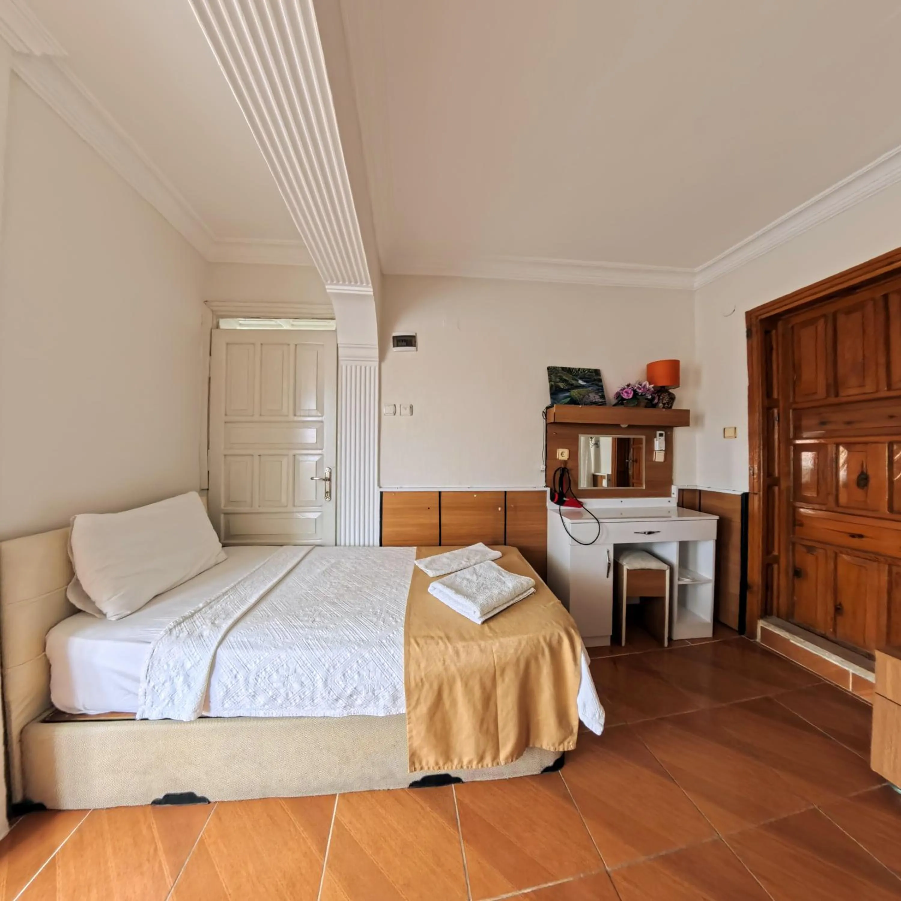 Bed in Kervansaray Hotel