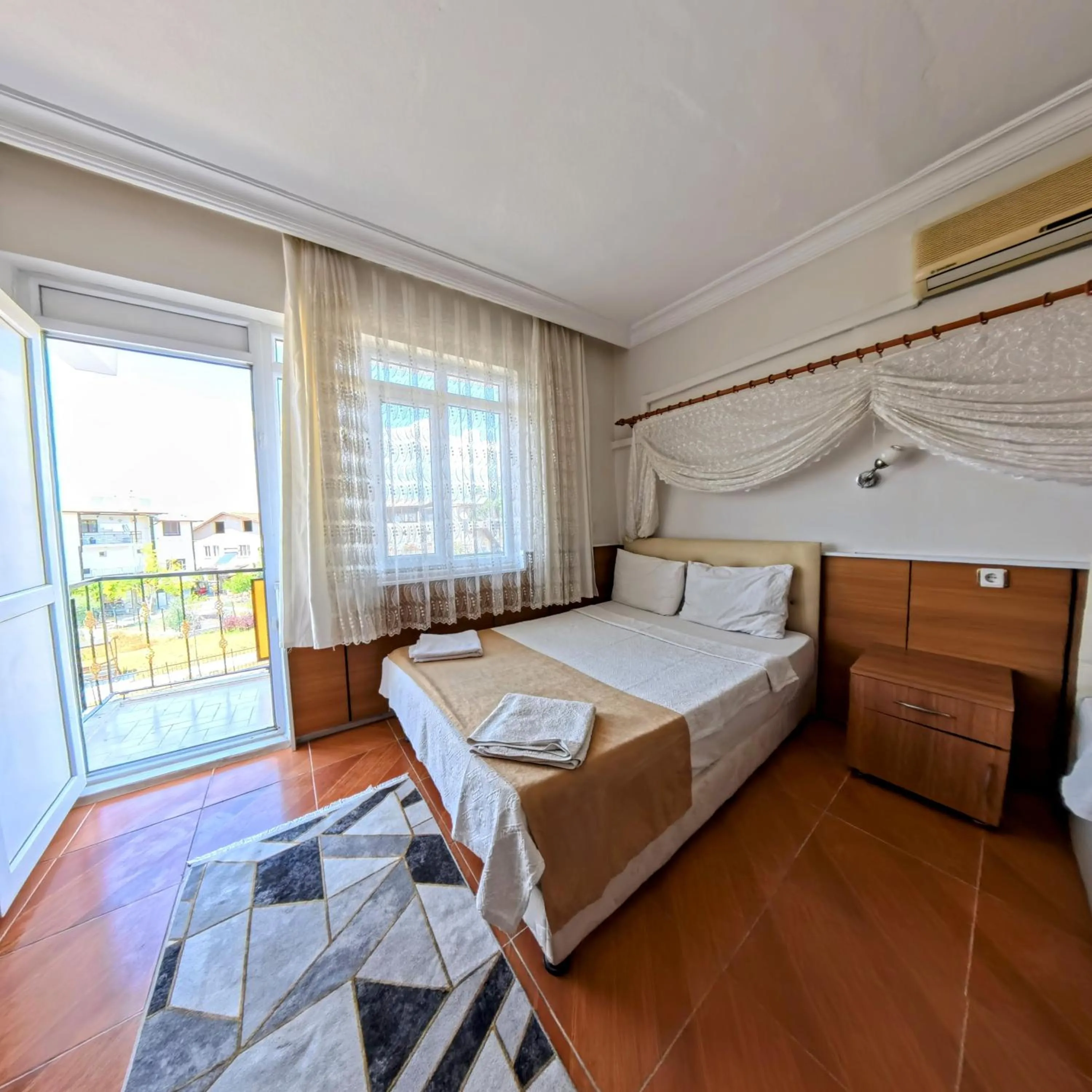 Bed in Kervansaray Hotel