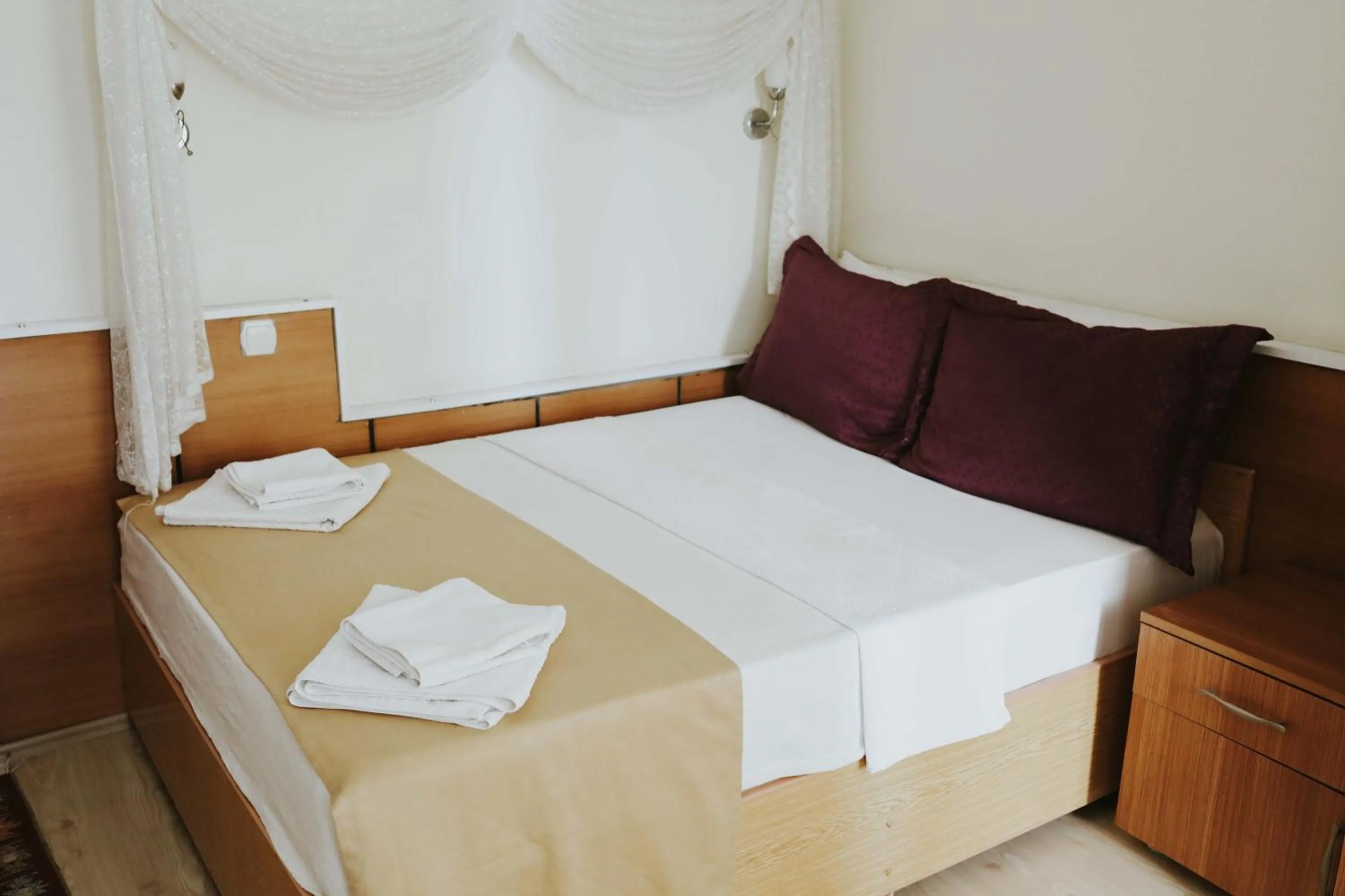 Bed in Kervansaray Hotel
