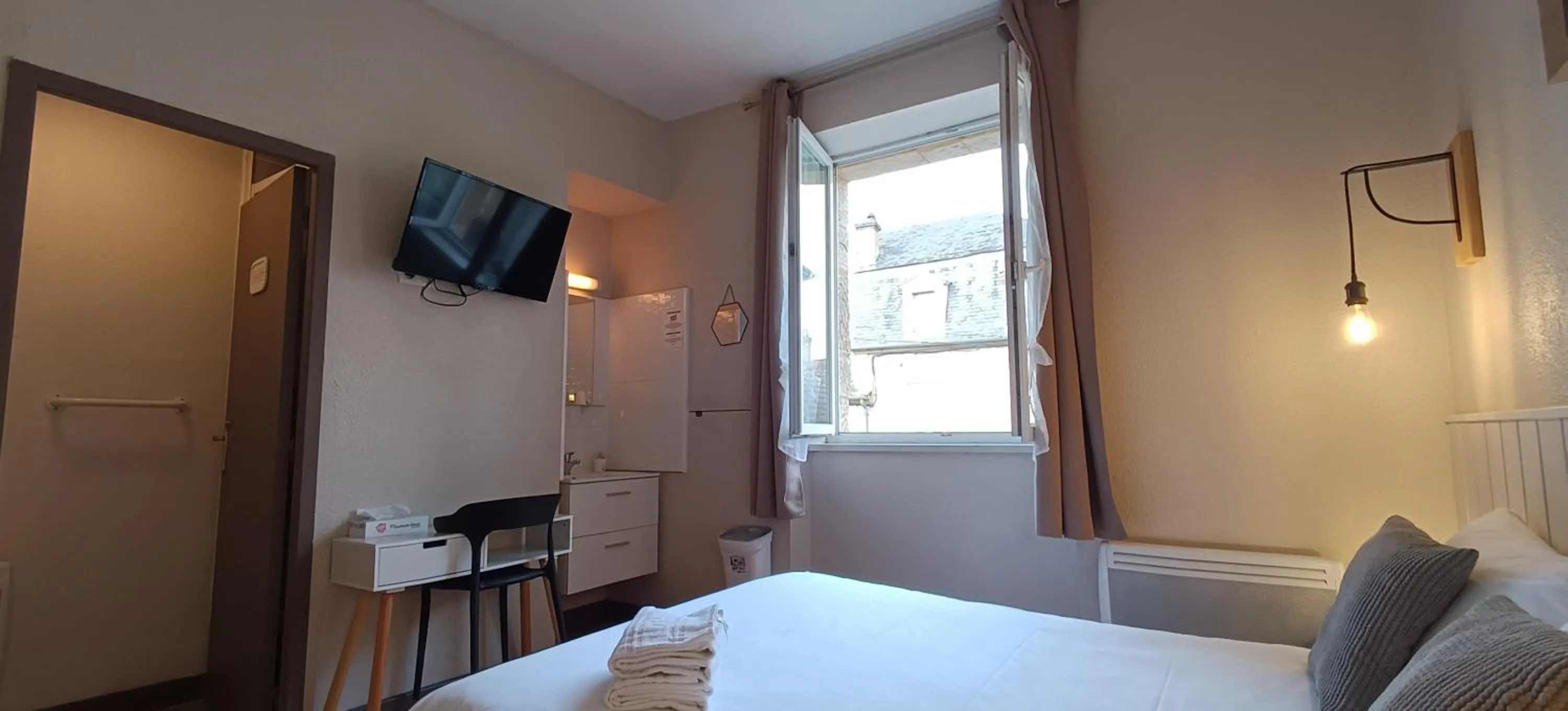 Bed in Hôtel Le P'tit Monde