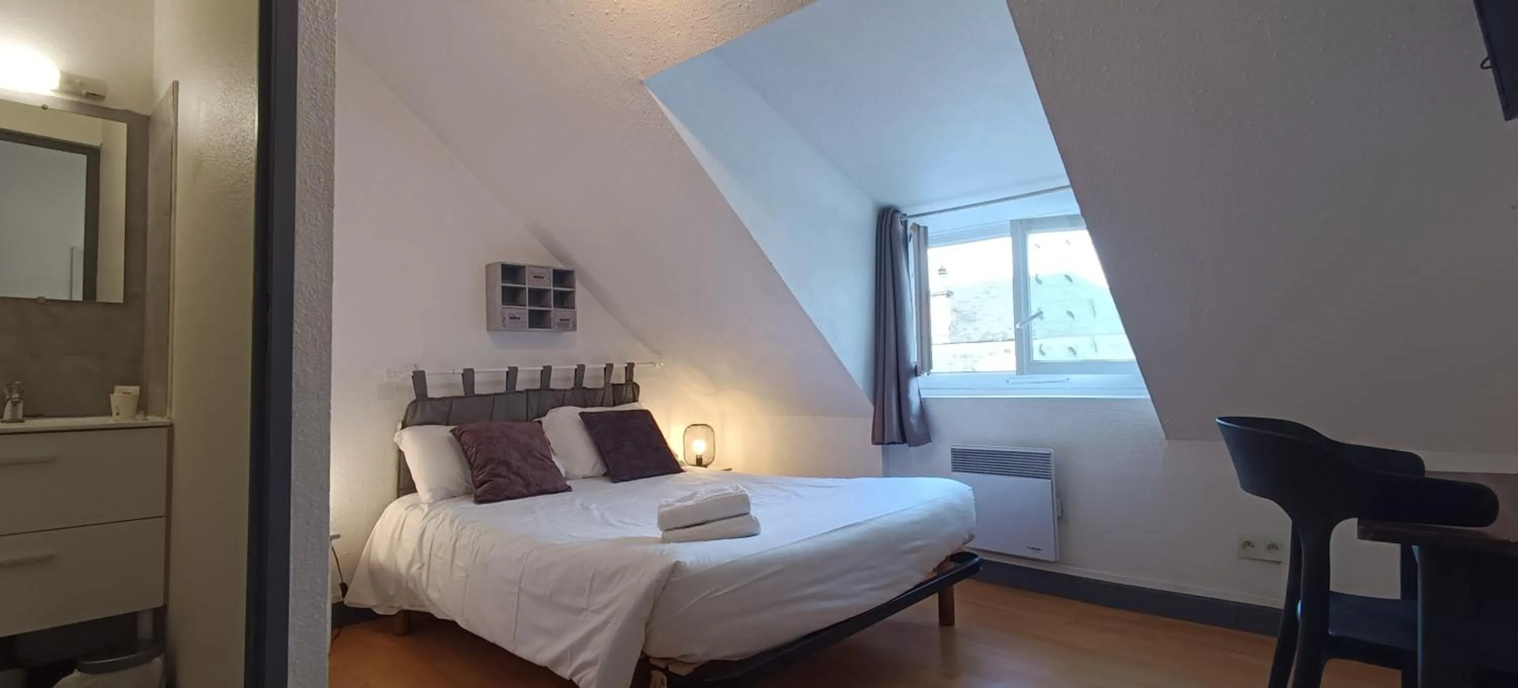 Bed in Hôtel Le P'tit Monde