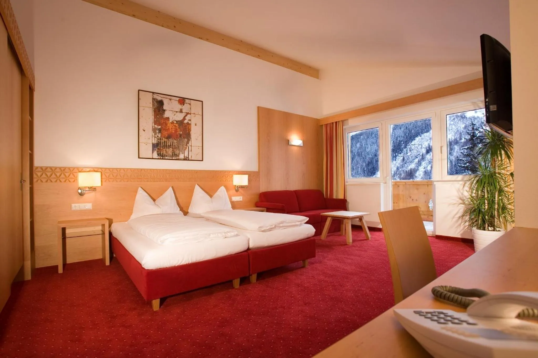 Bed in Hotel Karl Schranz