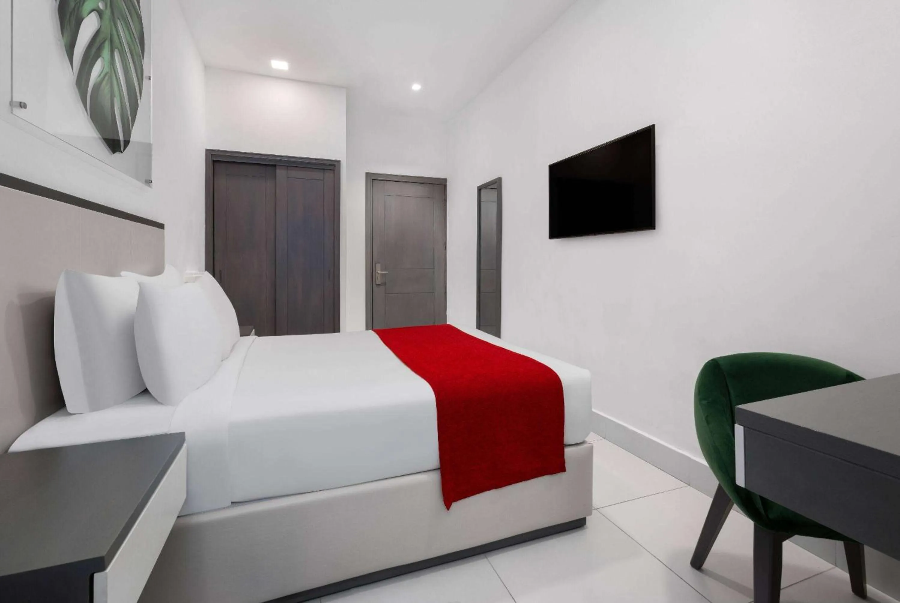 Photo of the whole room, Bed in Gran Hotel Europa Santo Domingo Trademark Collection by Wyndham