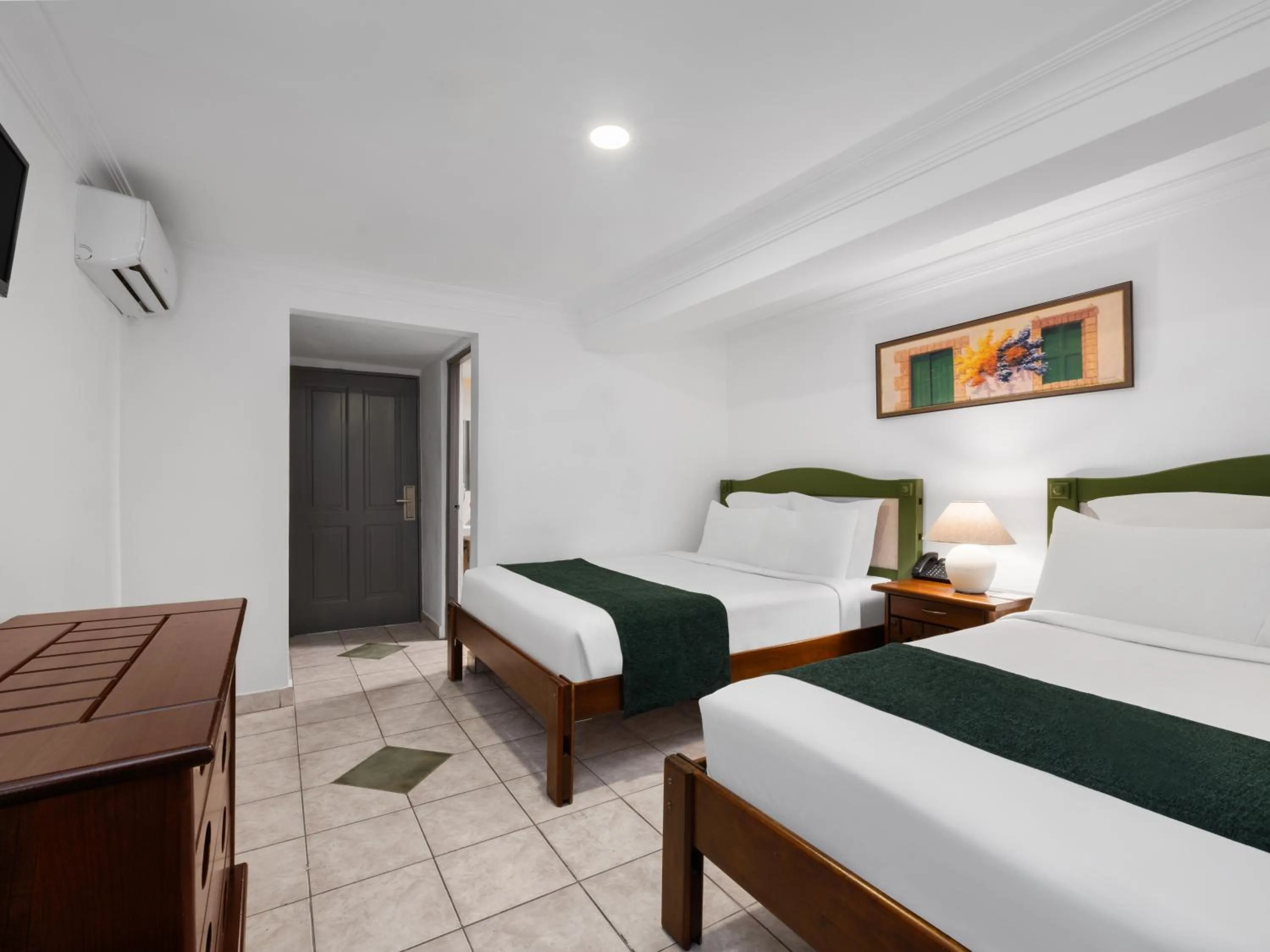 air conditioner, Bed in Gran Hotel Europa Santo Domingo Trademark Collection by Wyndham