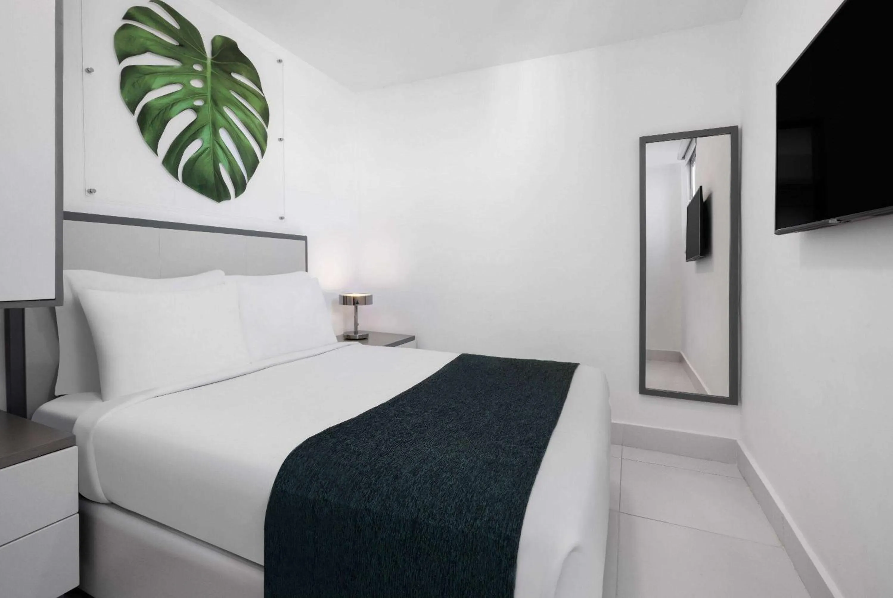 Photo of the whole room, Bed in Gran Hotel Europa Santo Domingo Trademark Collection by Wyndham