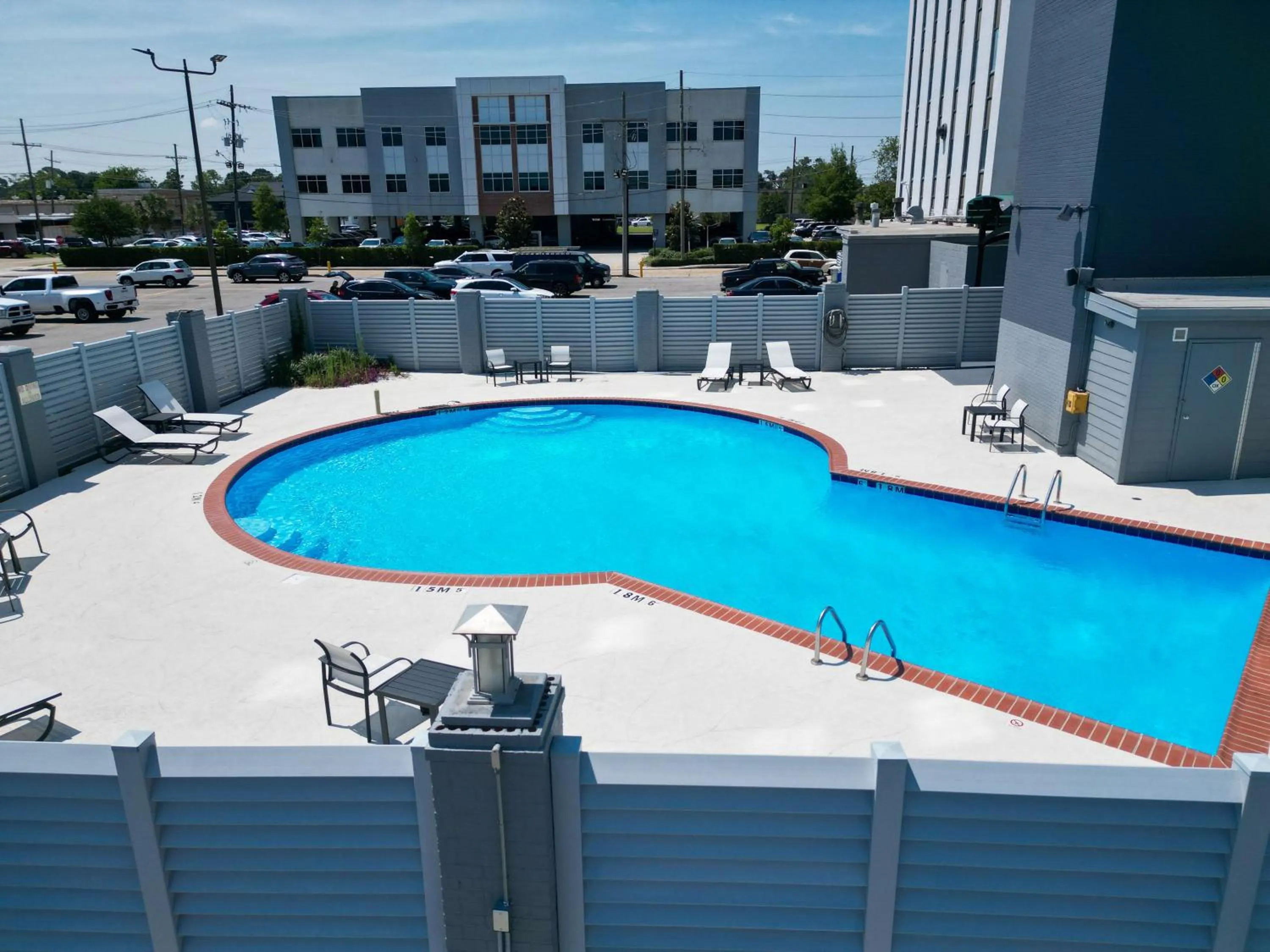 Swimming pool in Holiday Inn Metairie New Orleans by IHG