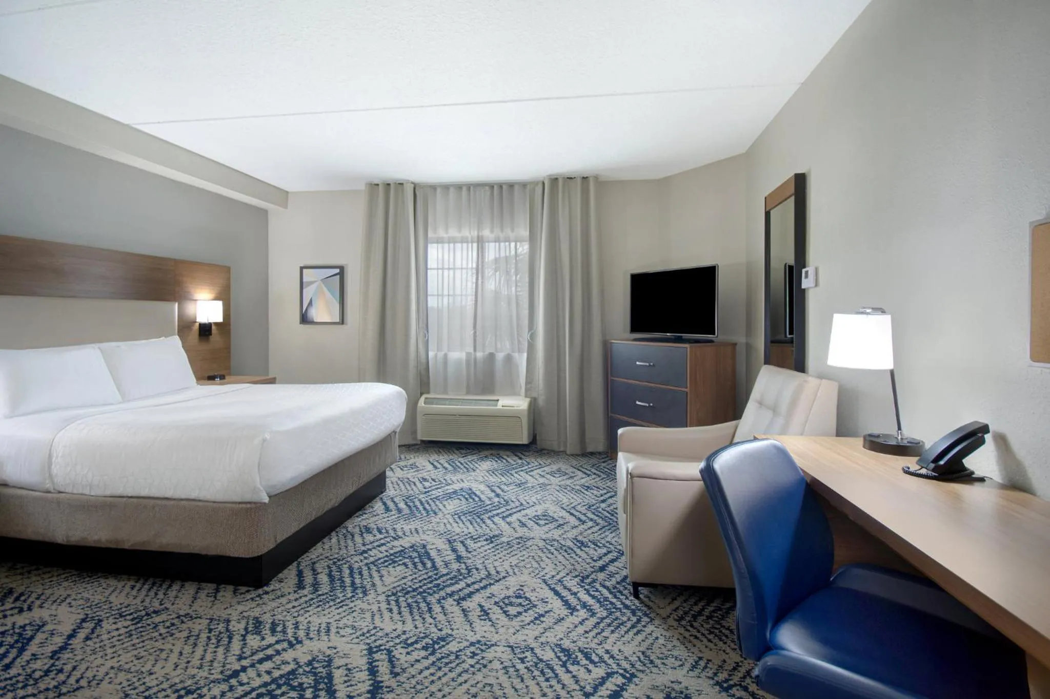 Photo of the whole room, Bed in Candlewood Suites Columbia-Fort Jackson by IHG