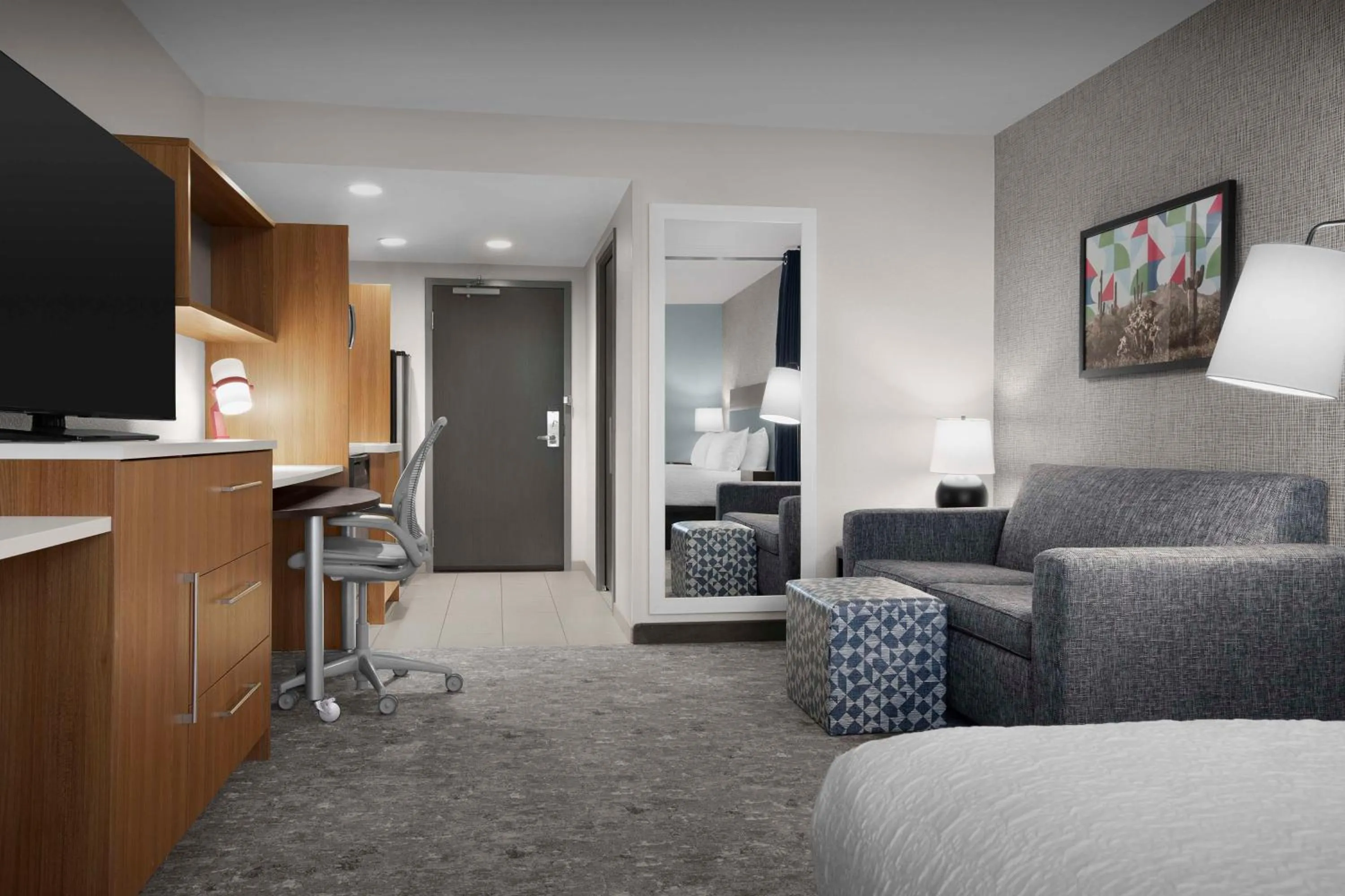Living room, Bed in Home2 Suites by Hilton Phoenix Chandler