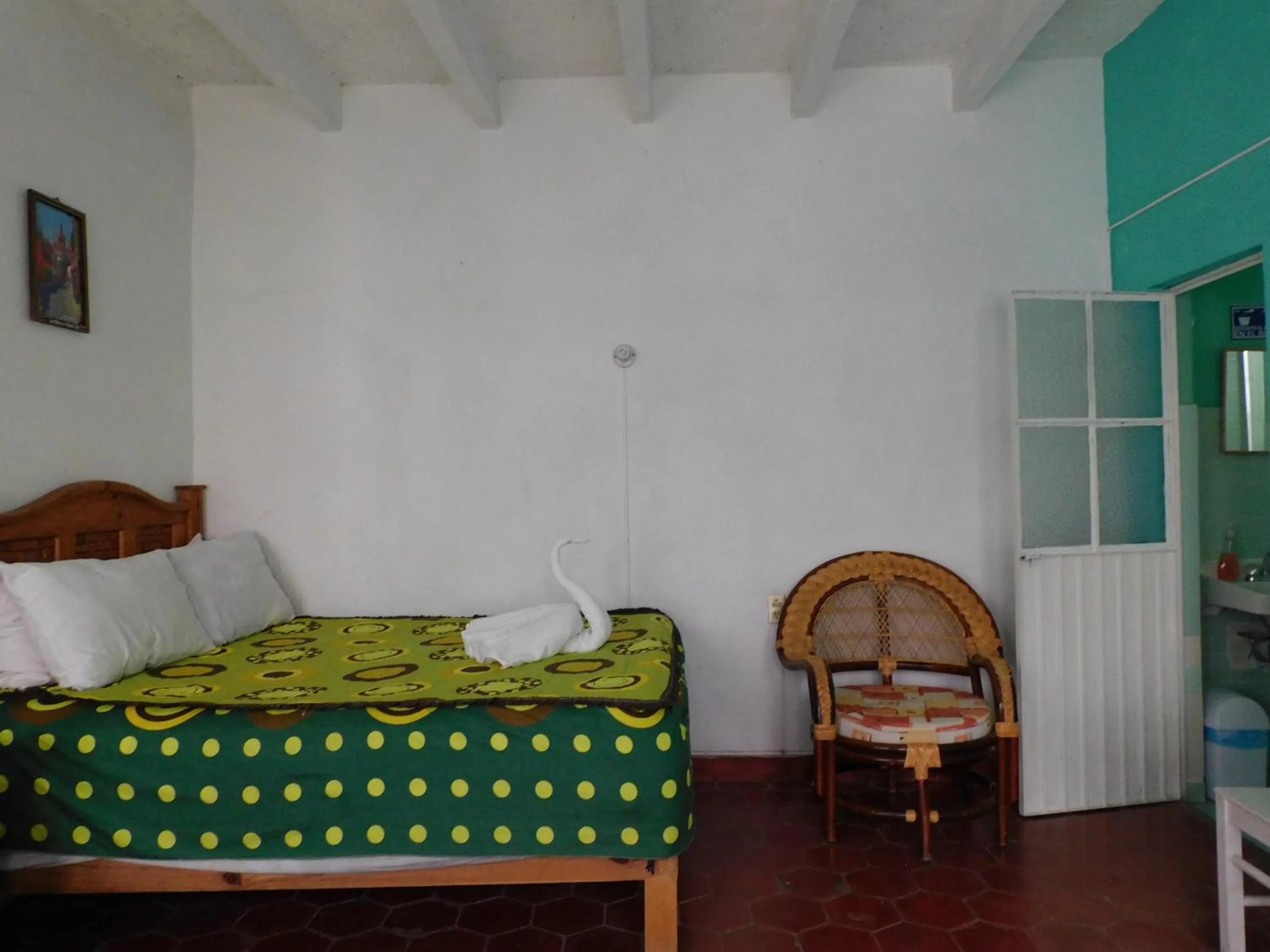 Bed in Hotel Elohim by Rotamundos