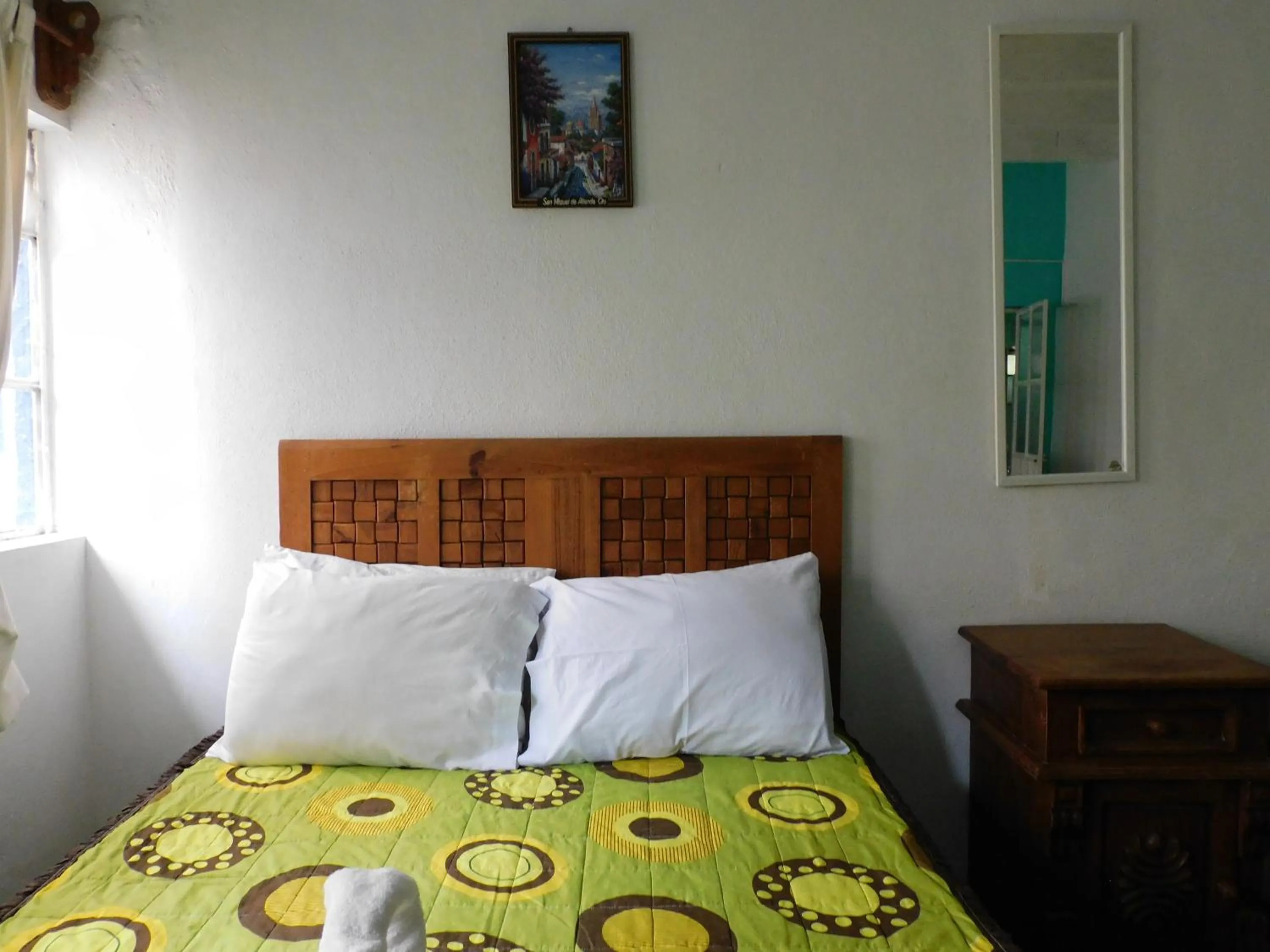 Bed in Hotel Elohim by Rotamundos